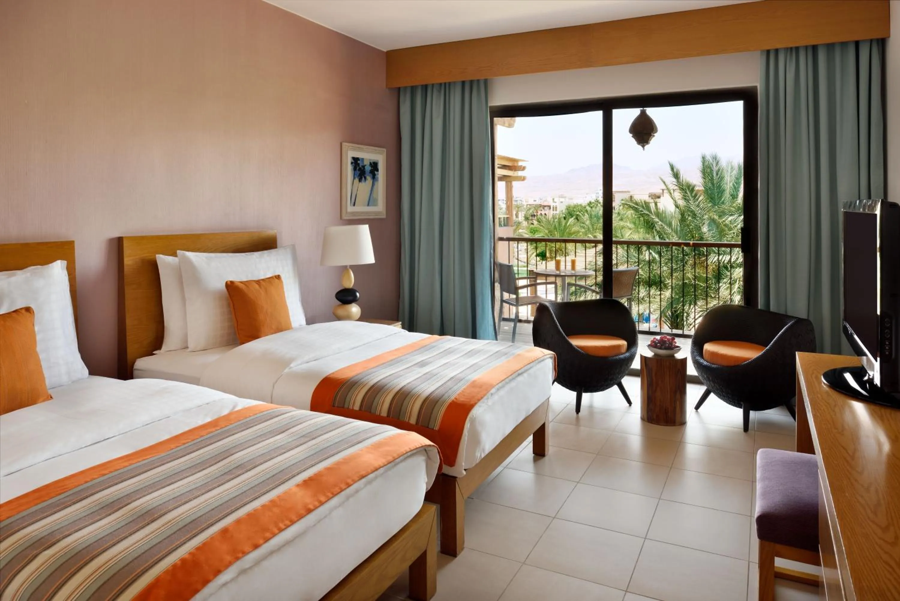 Photo of the whole room, Bed in Mövenpick Resort & Spa Tala Bay Aqaba