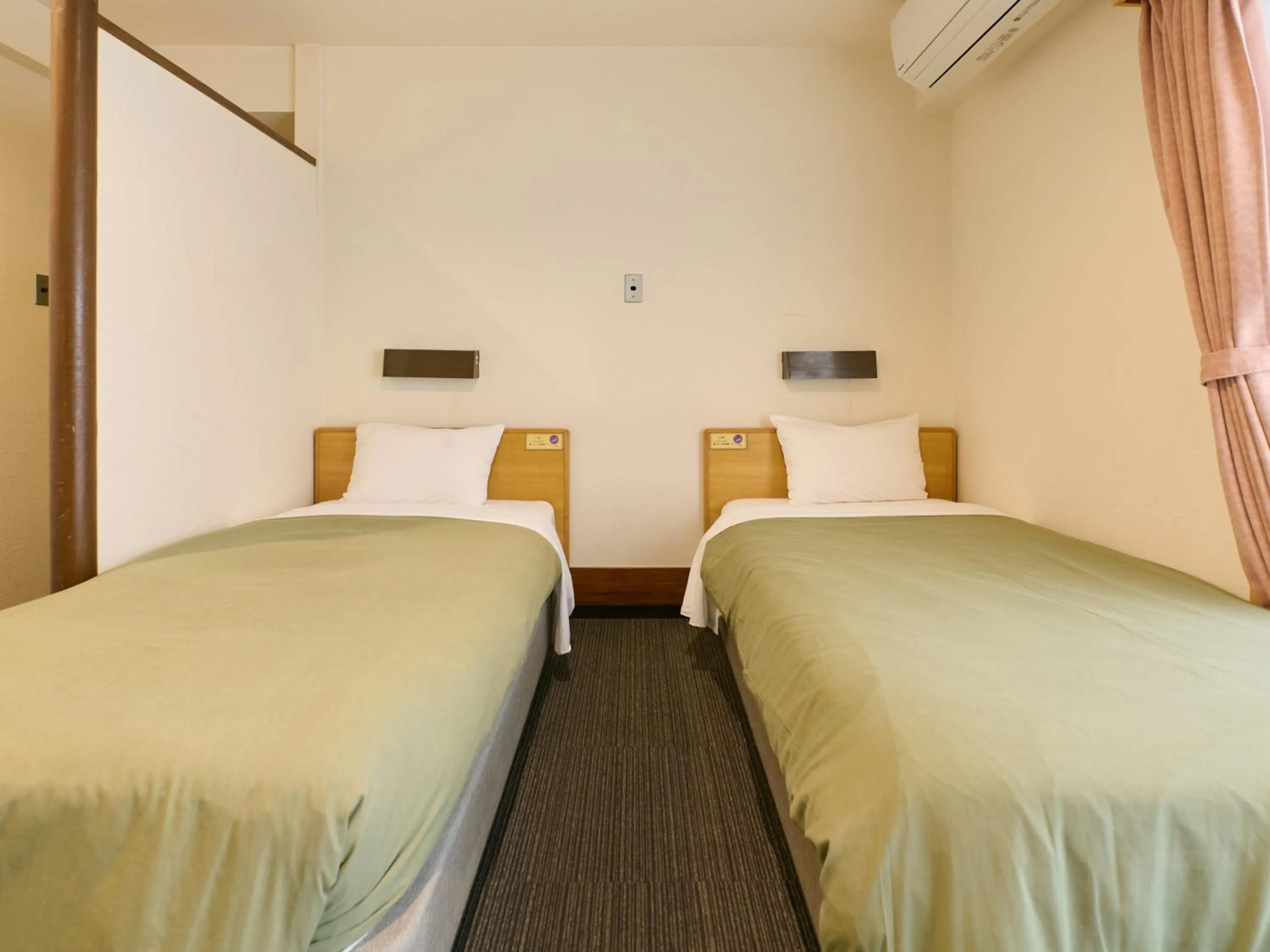 Bed in Tabist Hotel Tetora Ikebukuro