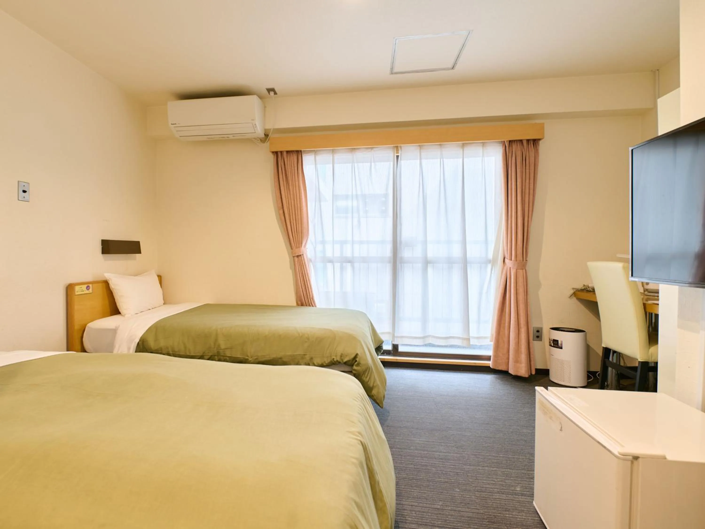 Bed in Tabist Hotel Tetora Ikebukuro