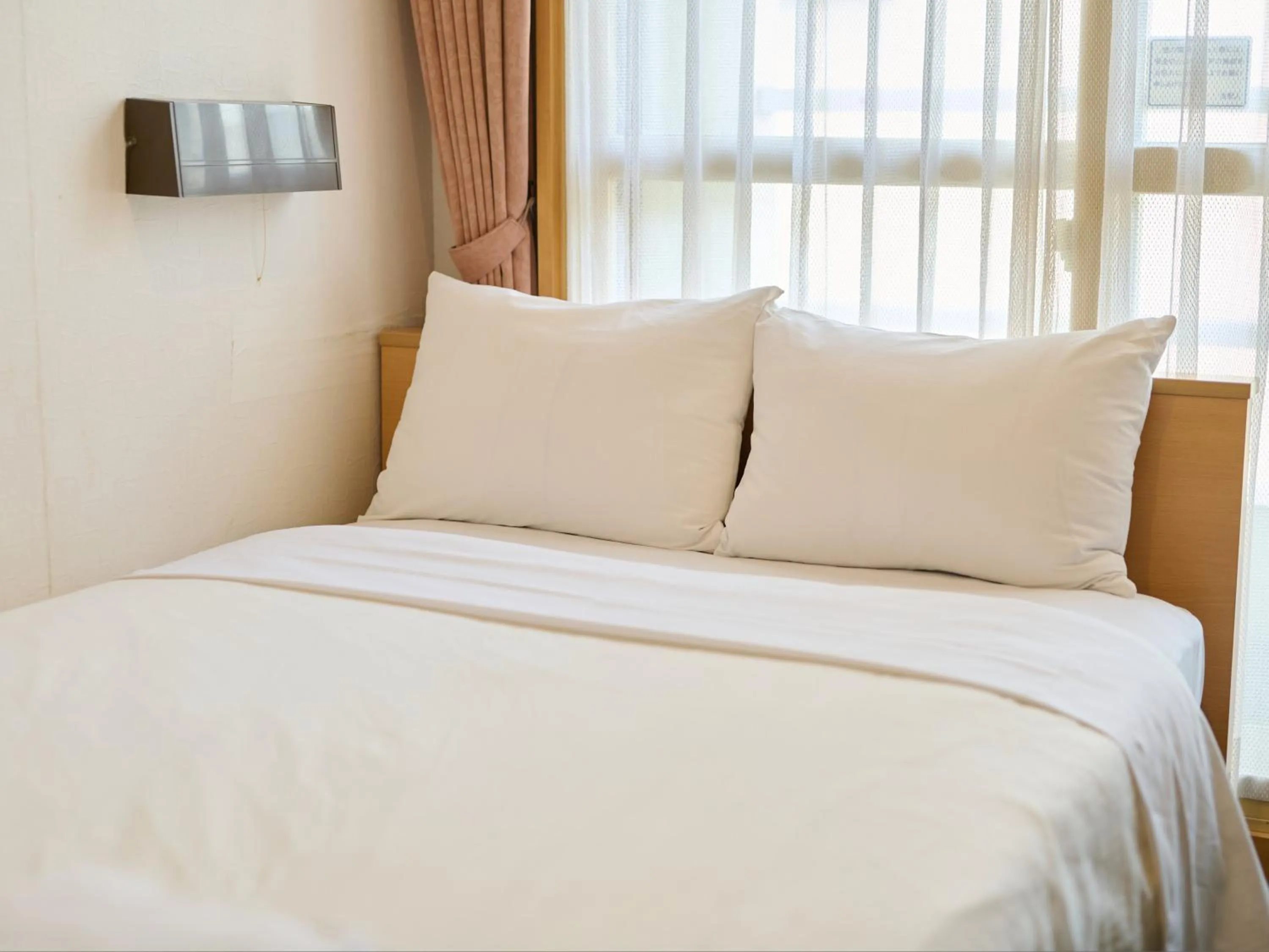 Bed in Tabist Hotel Tetora Ikebukuro