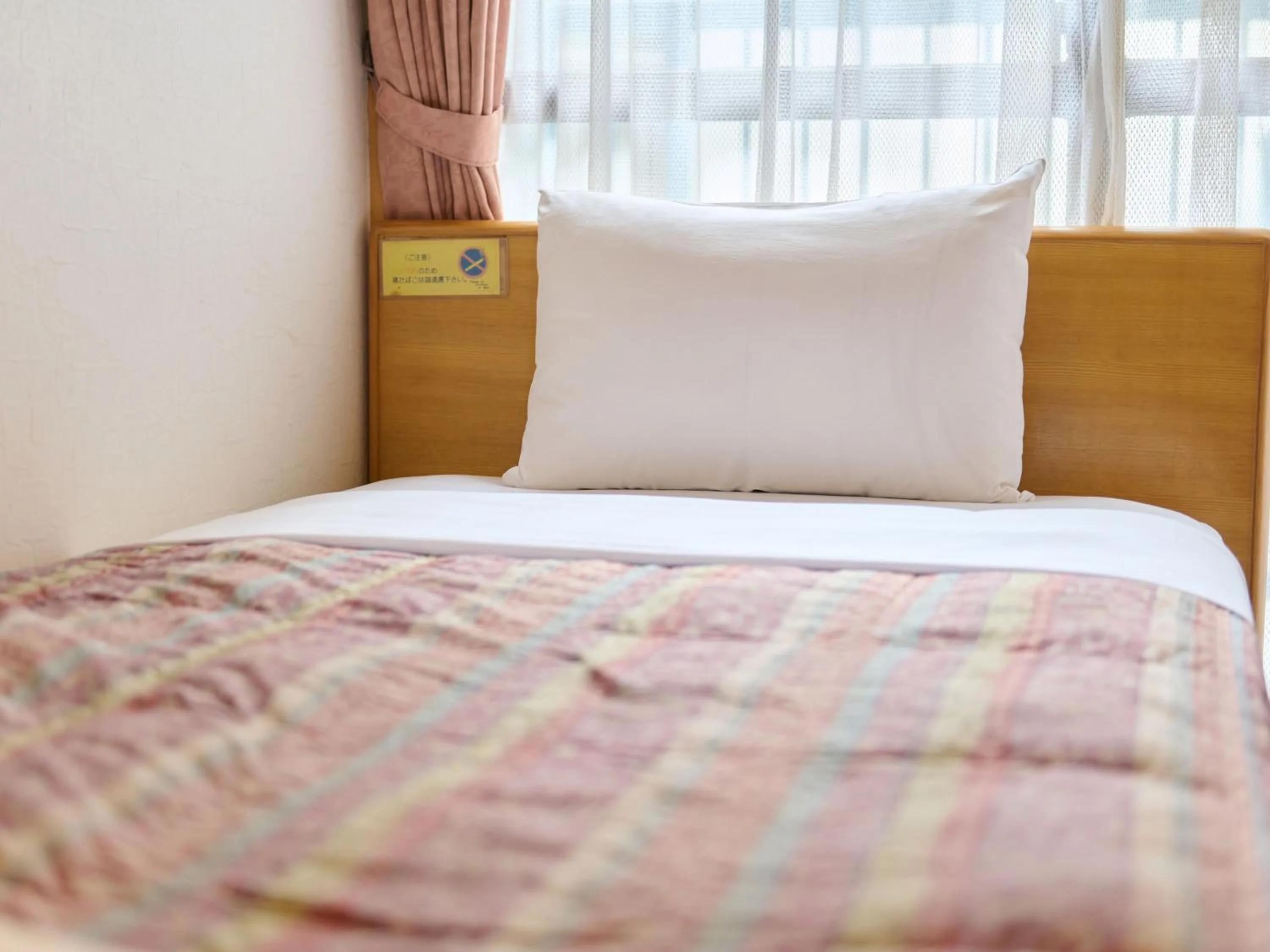 Bed in Tabist Hotel Tetora Ikebukuro