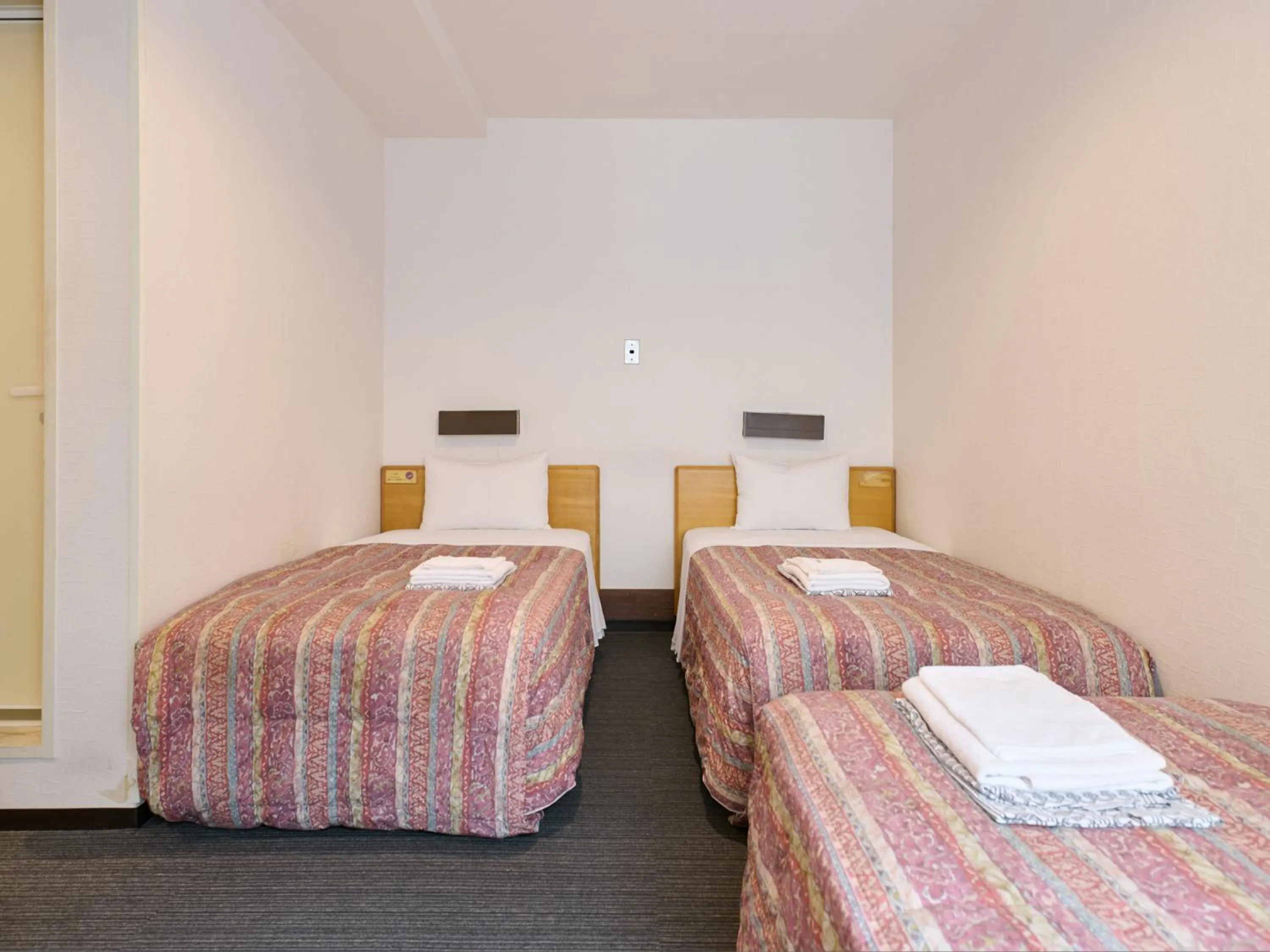 Bed in Tabist Hotel Tetora Ikebukuro