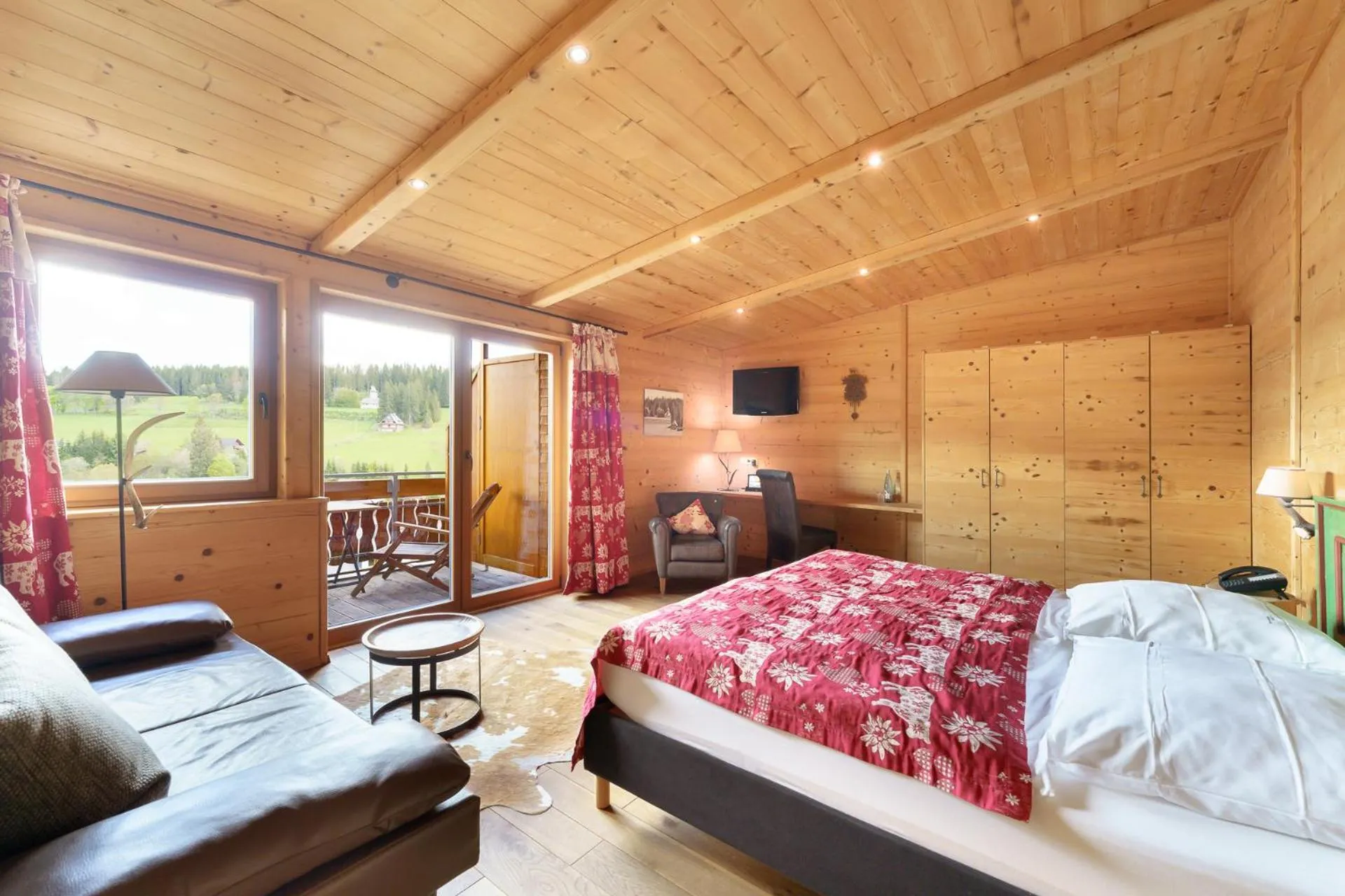 Seating area, Bed in Hotel Schlehdorn