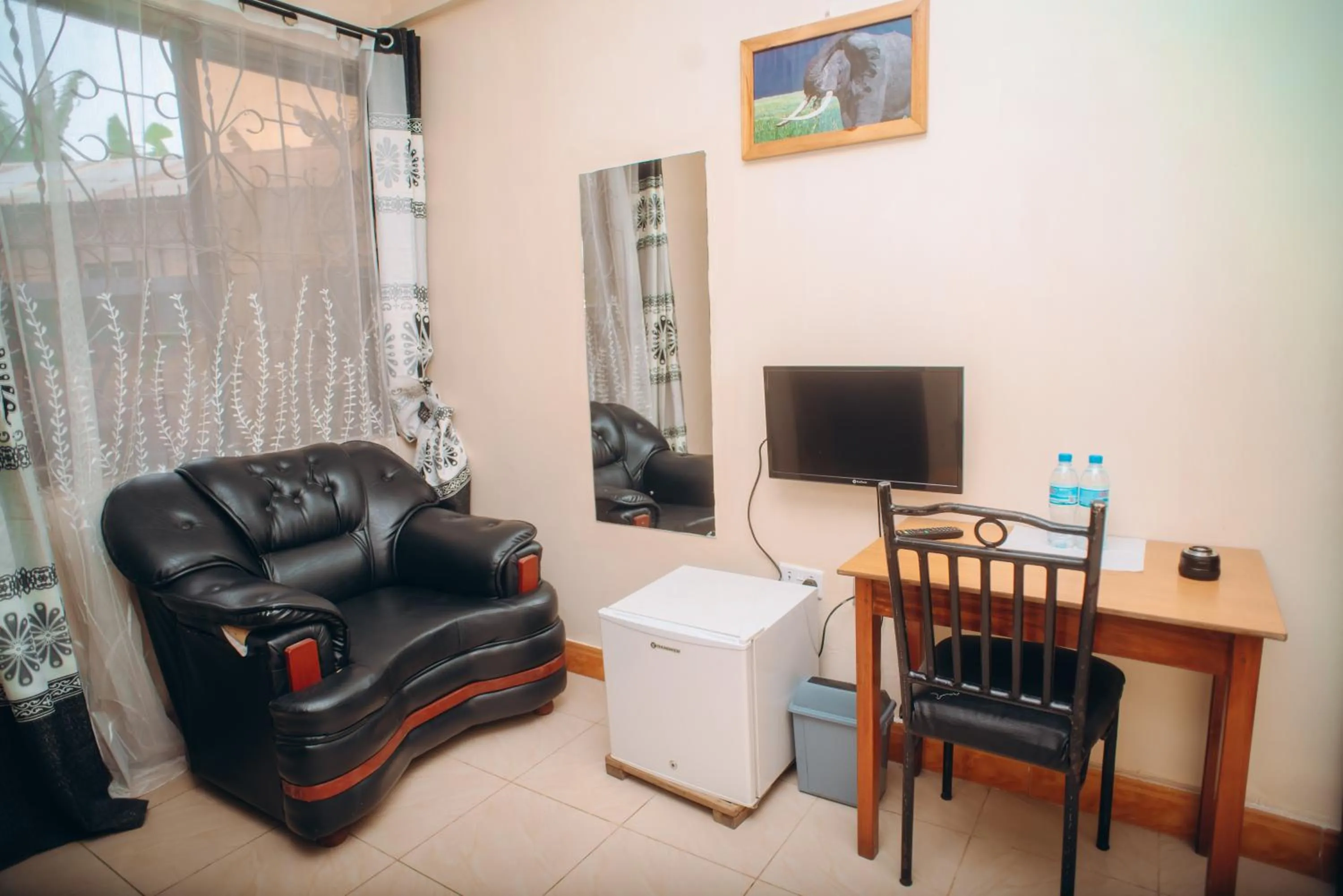 Seating area in Arusha Giraffe Lodge