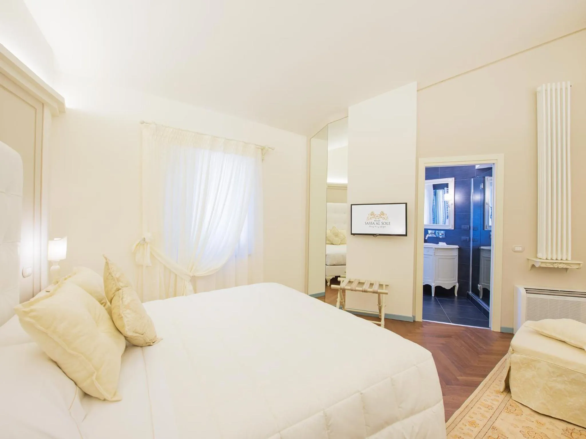 Bed in Relais Sassa al Sole