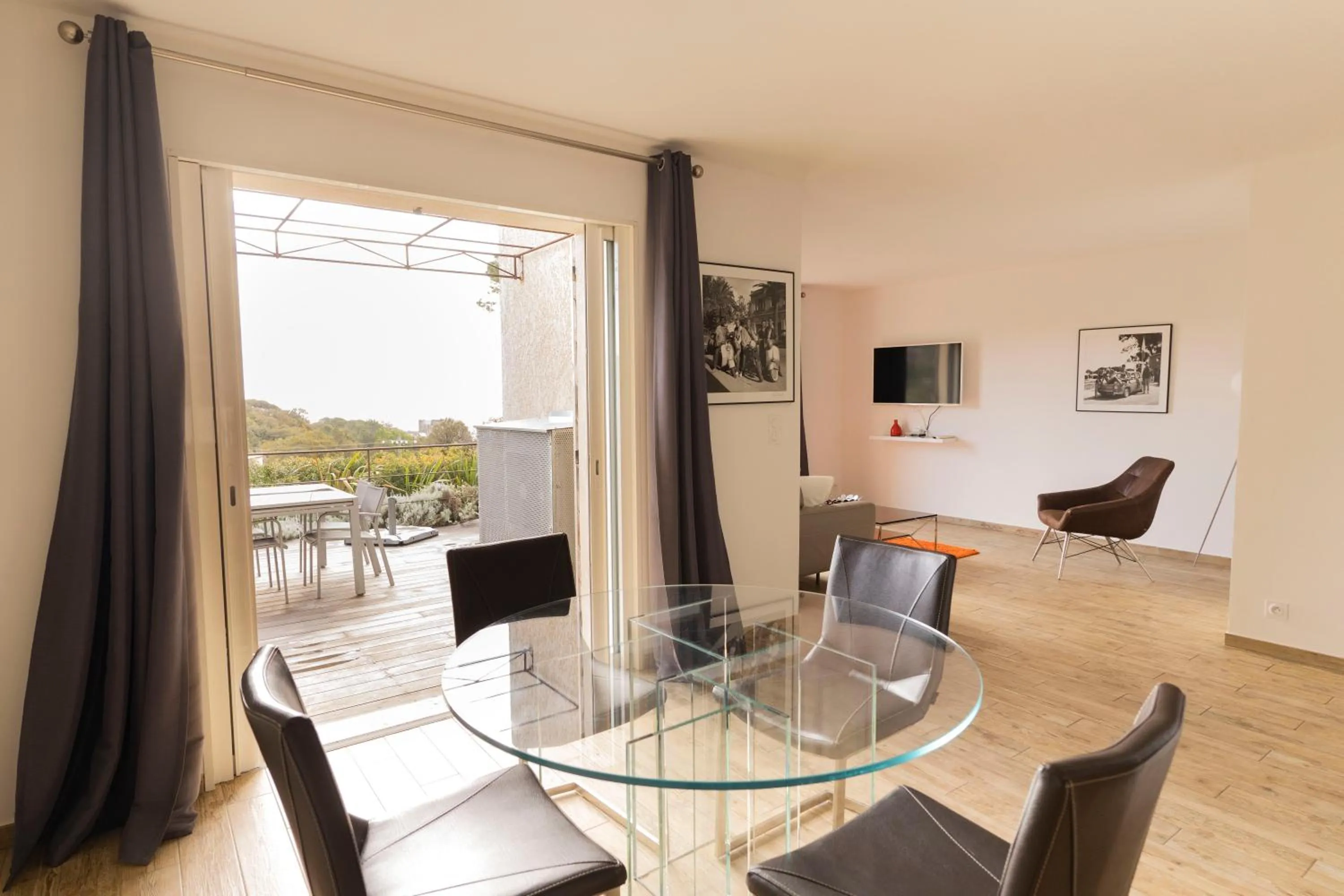 Communal lounge/ TV room in Suites in Erbalunga