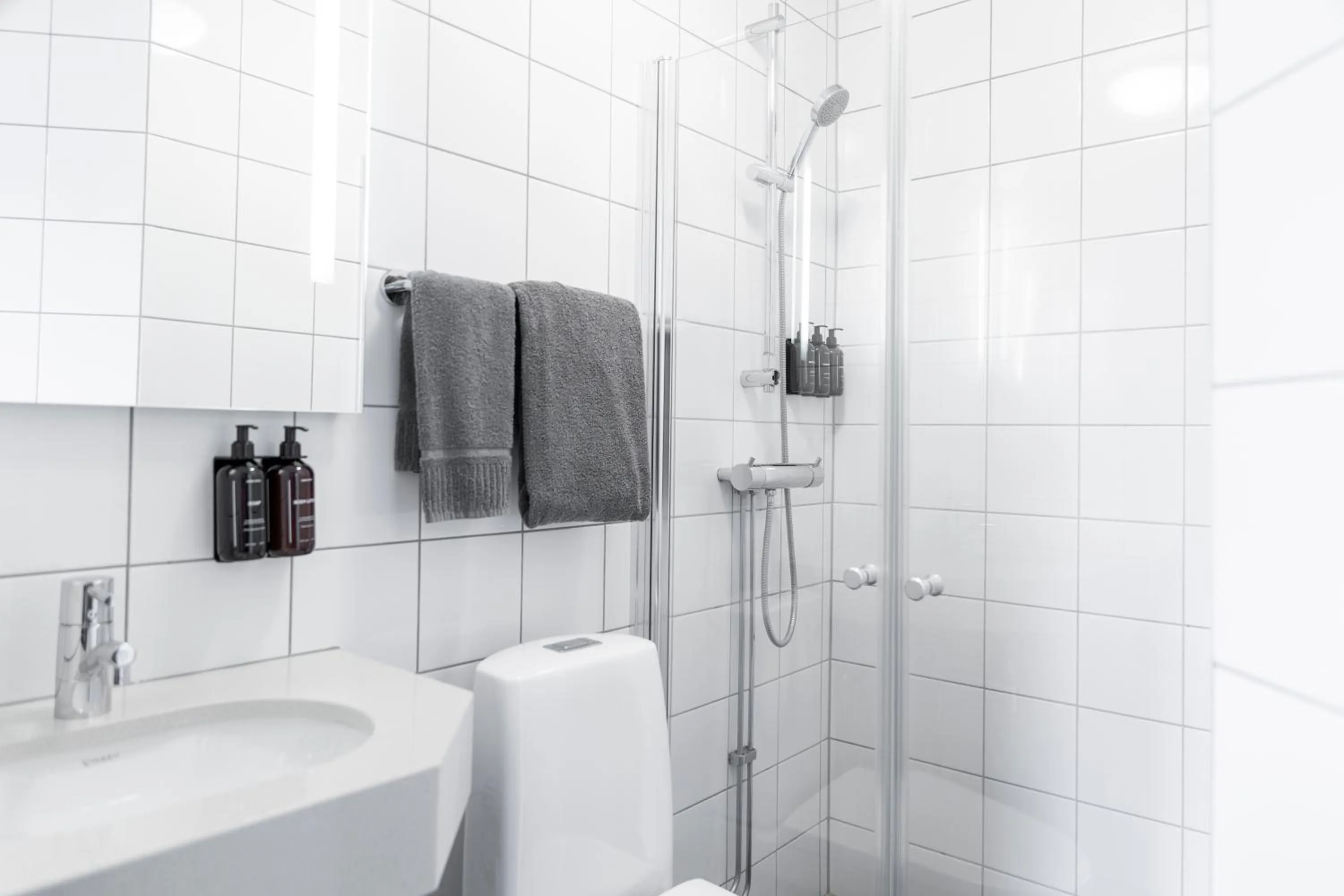Shower in Home Hotel Majoren