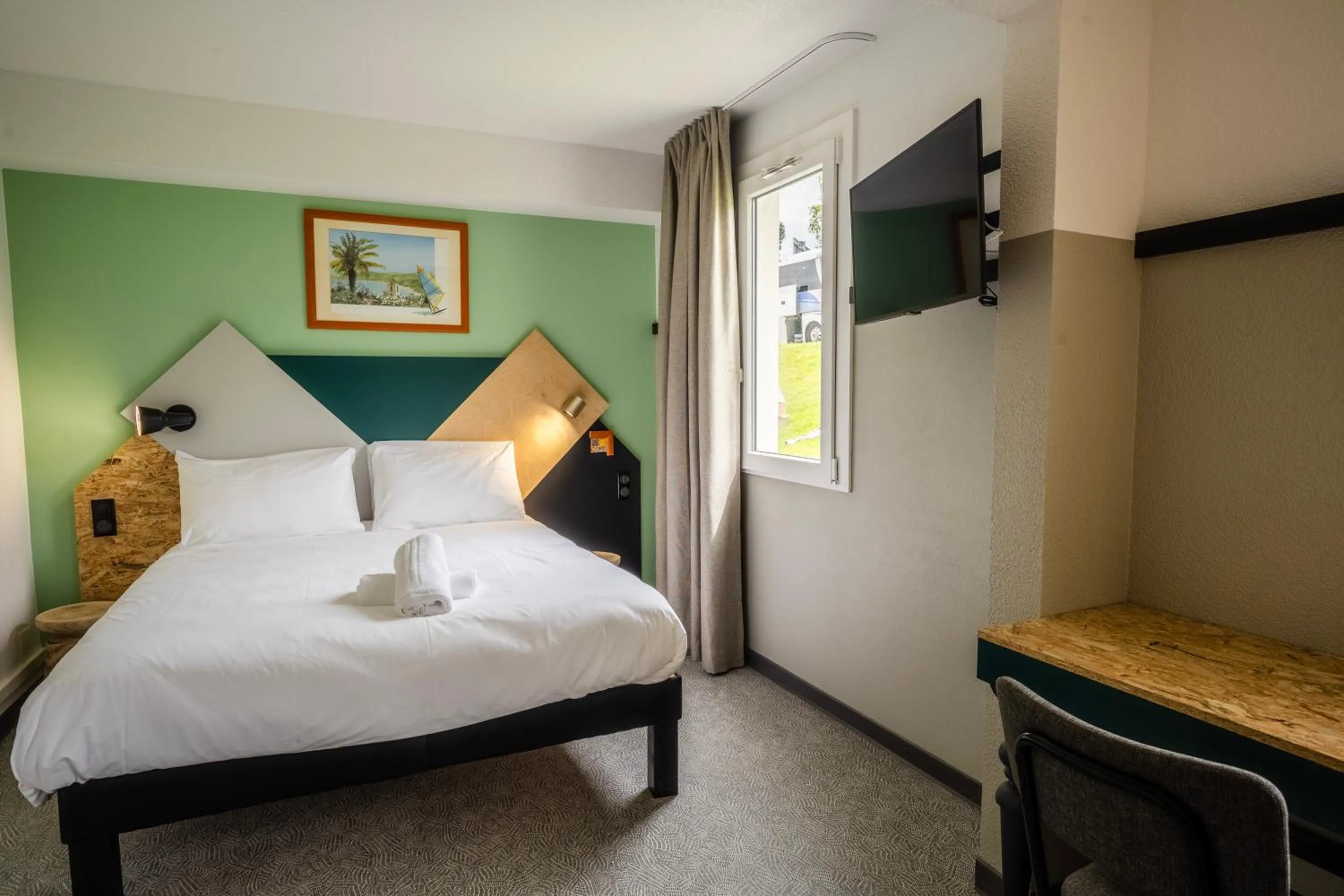 Bed in greet Hôtel Montbéliard