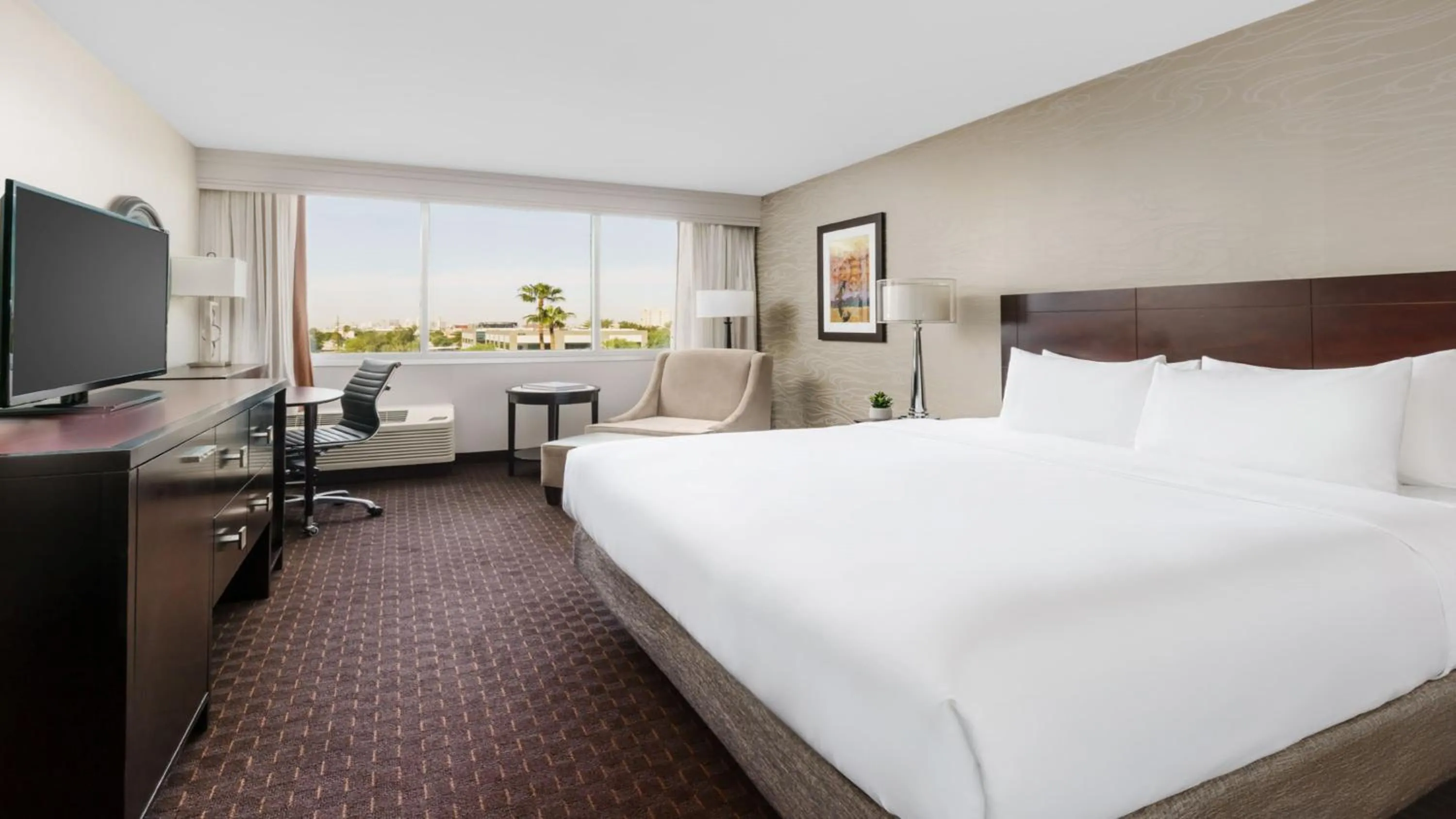 Photo of the whole room, Bed in Crowne Plaza Phoenix Airport - PHX by IHG