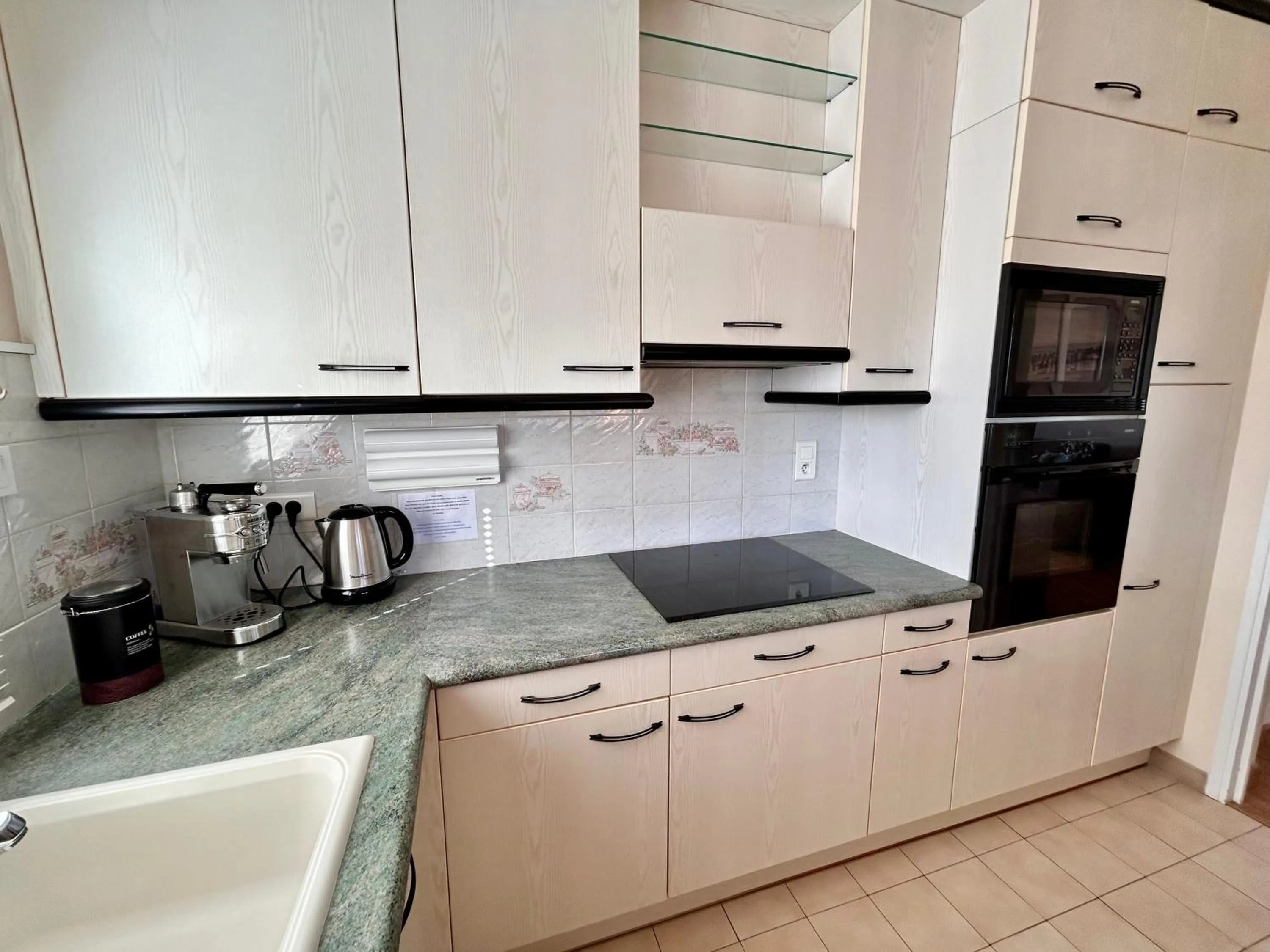 kitchen in Hôtel La Pinède