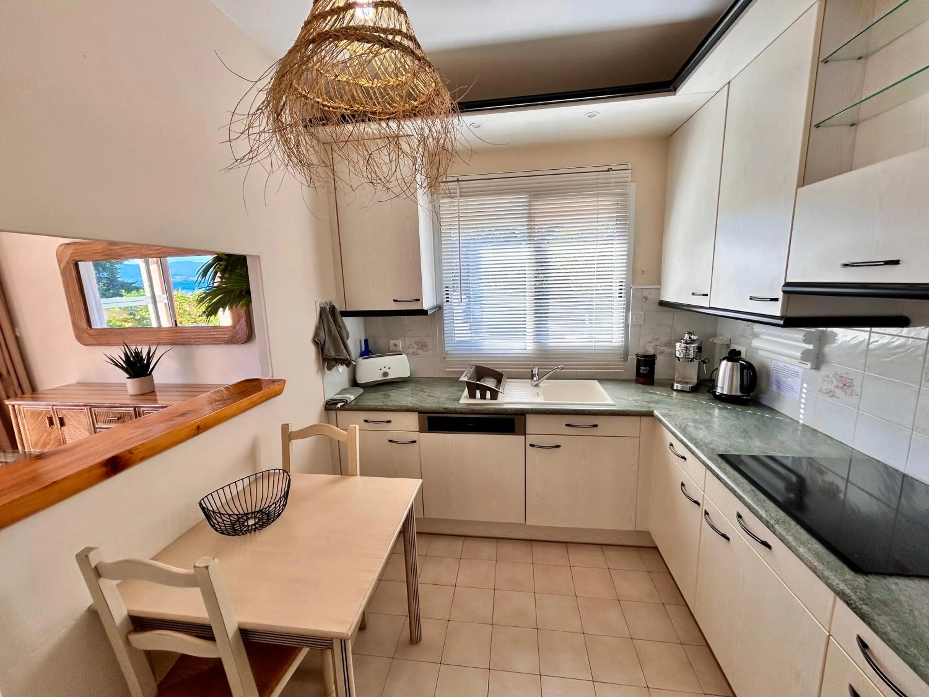 kitchen in Hôtel La Pinède