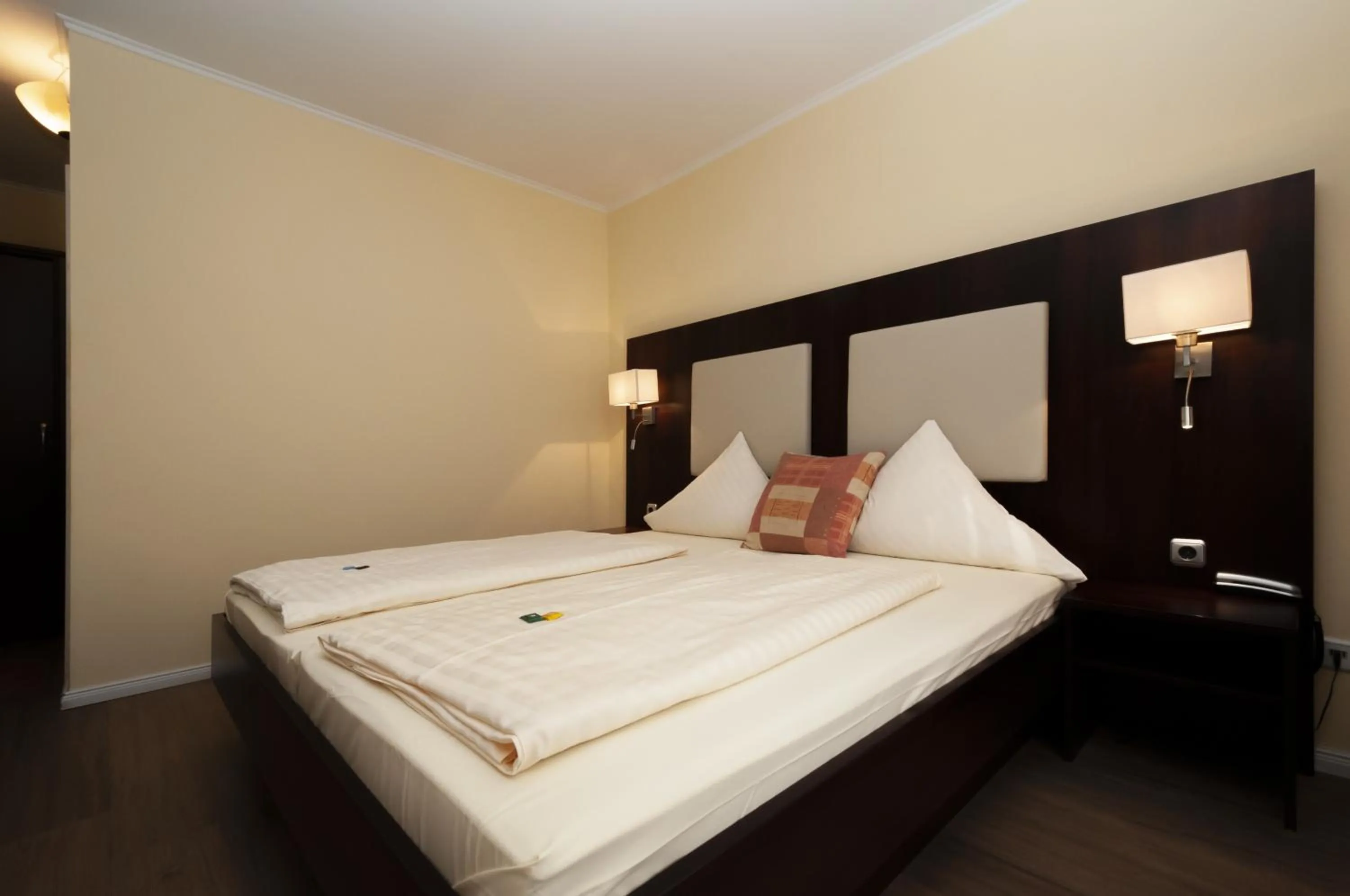 Photo of the whole room, Bed in Hotel Grüne Tanne