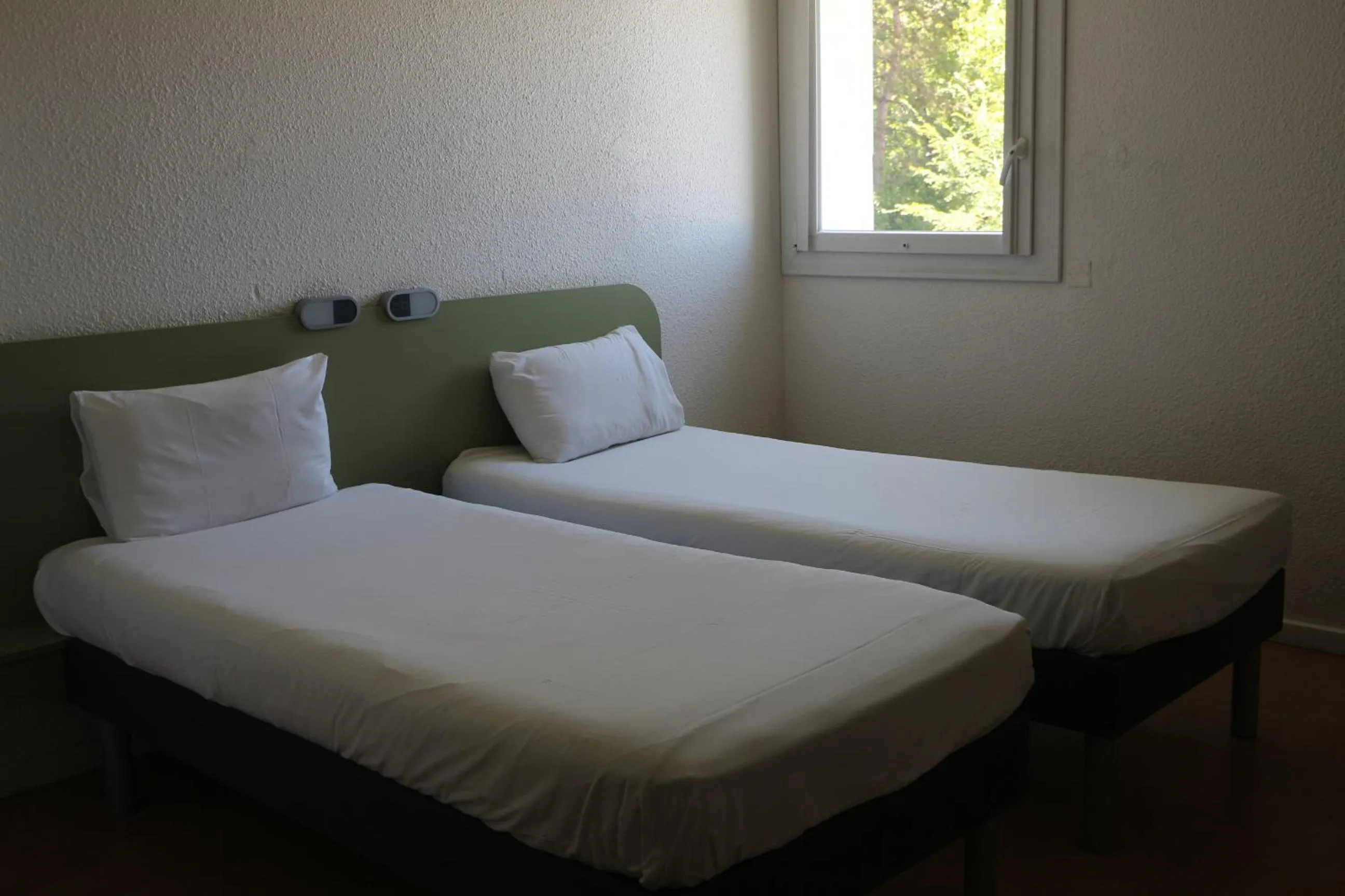 Bed in Ibis Budget Agen