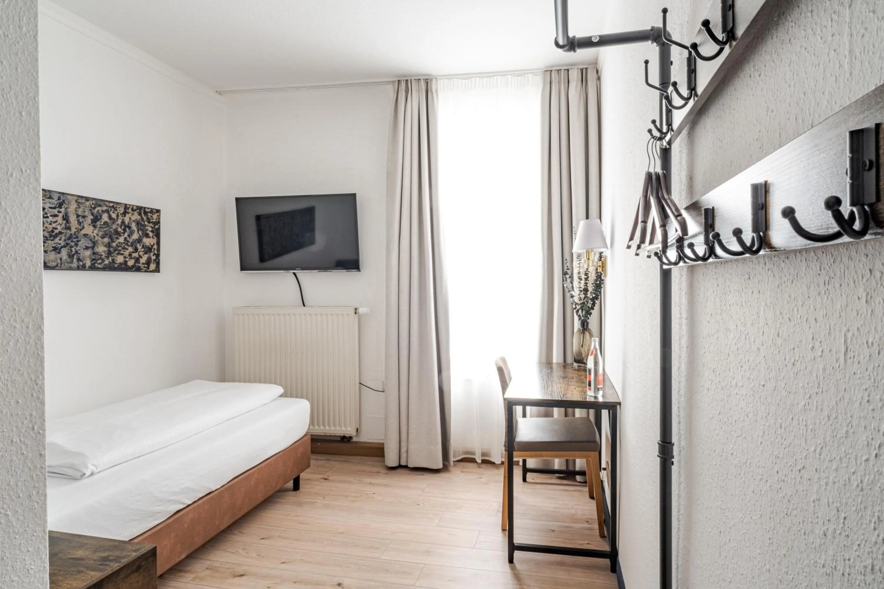 Bed in Hotel Goldener Hirsch