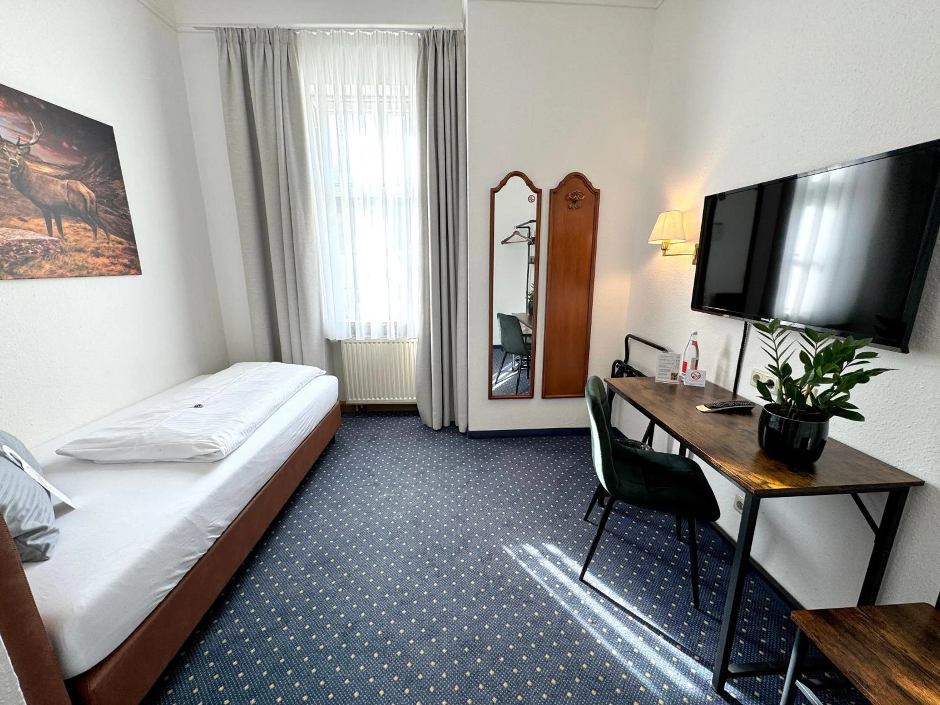 Photo of the whole room, Bed in Hotel Goldener Hirsch