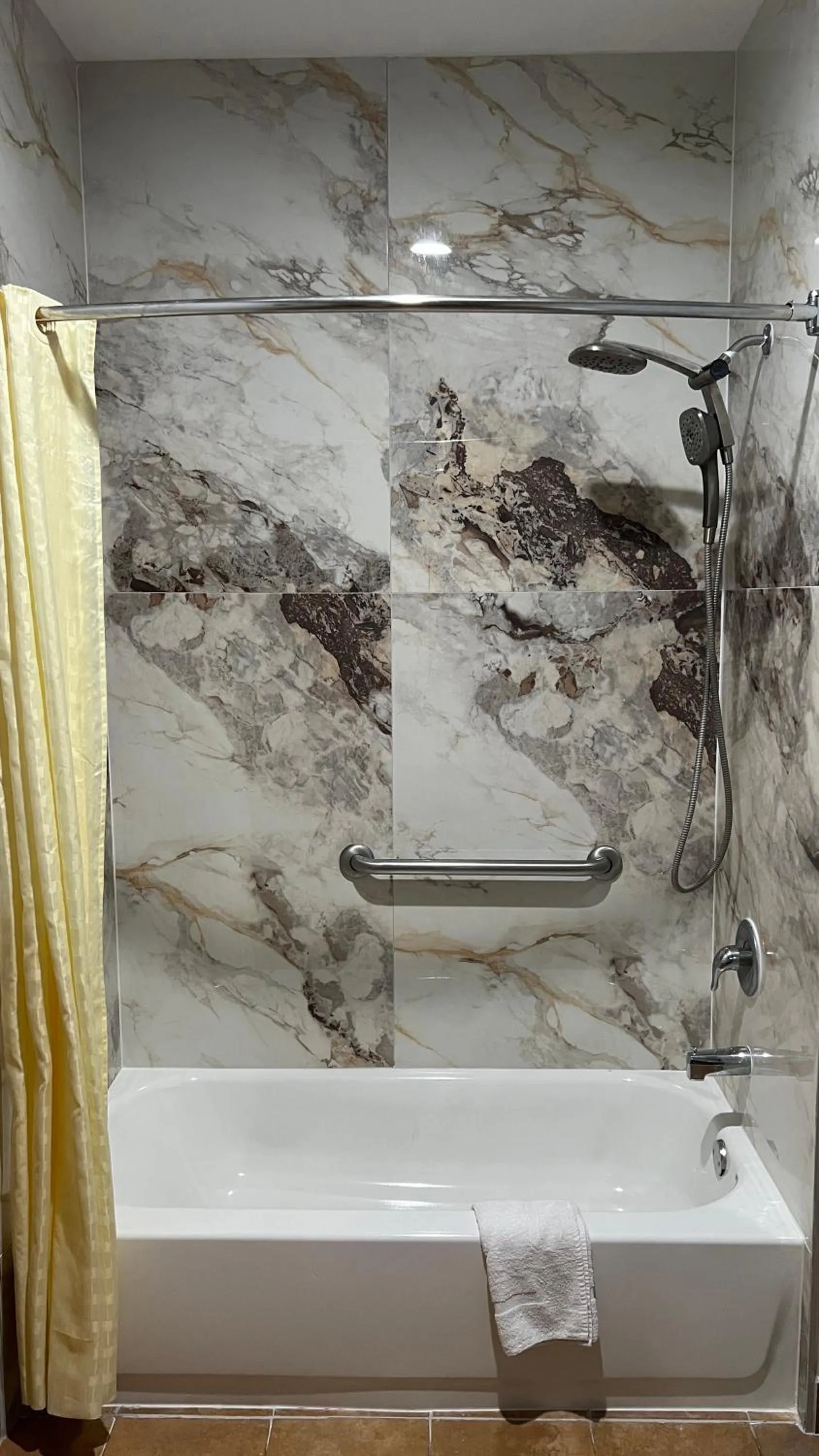 The Symphony Inn & Suites