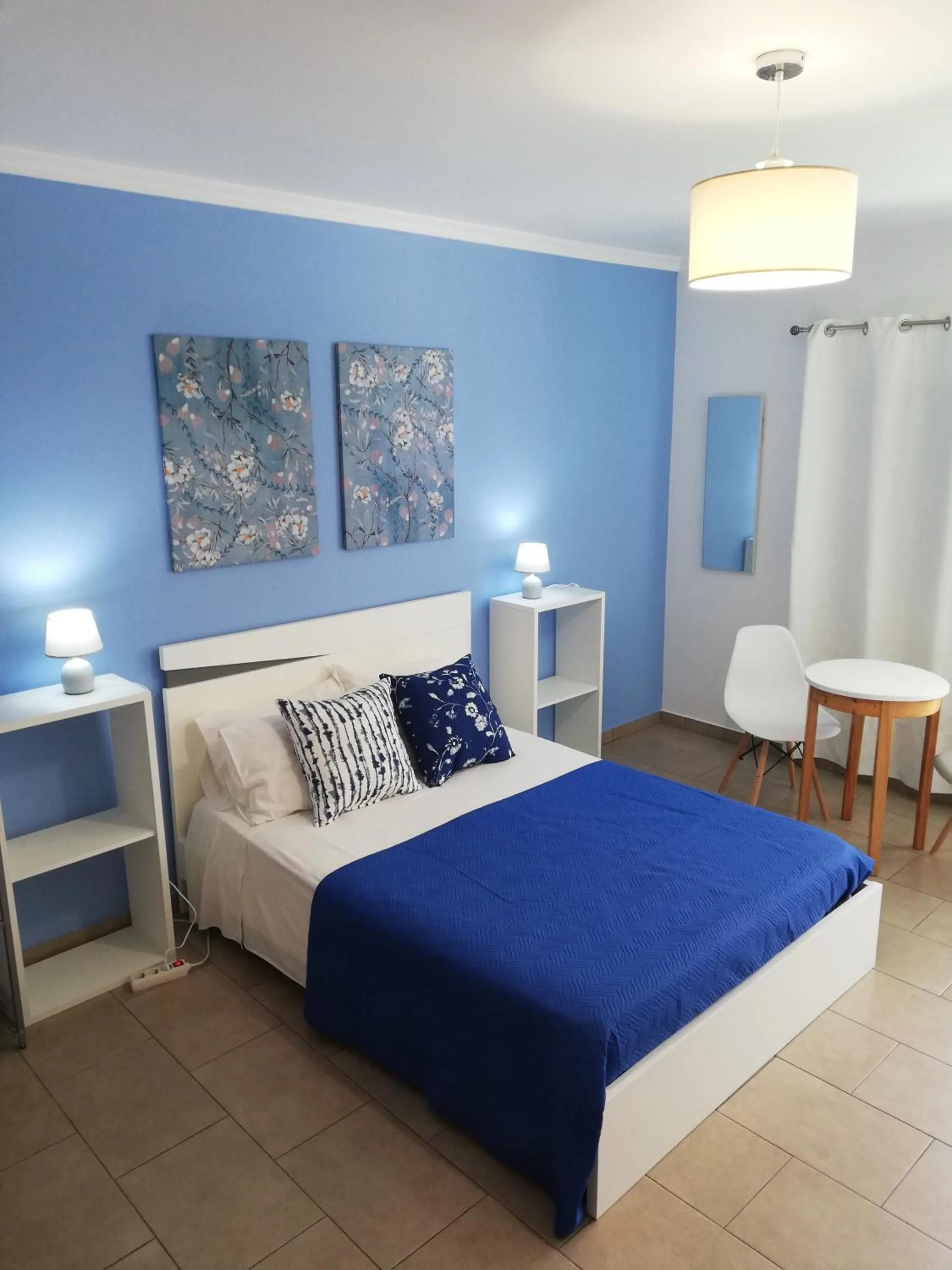 Photo of the whole room, Bed in FX Pena