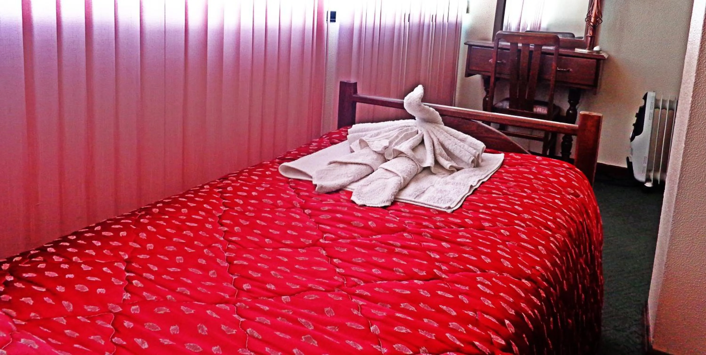 Bed in Hotel Alexander