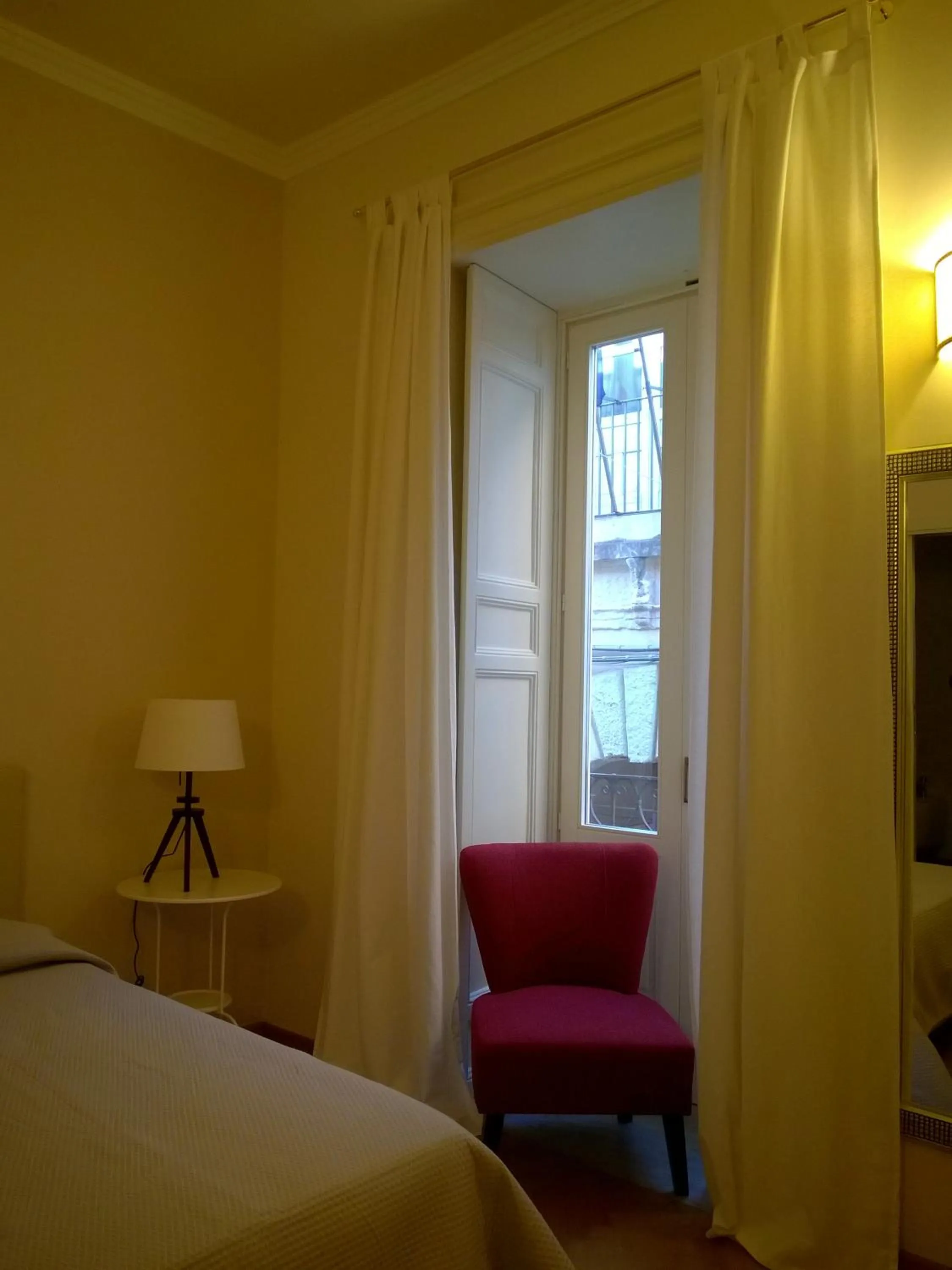 Seating area, Bed in B&B Casa D'alleri