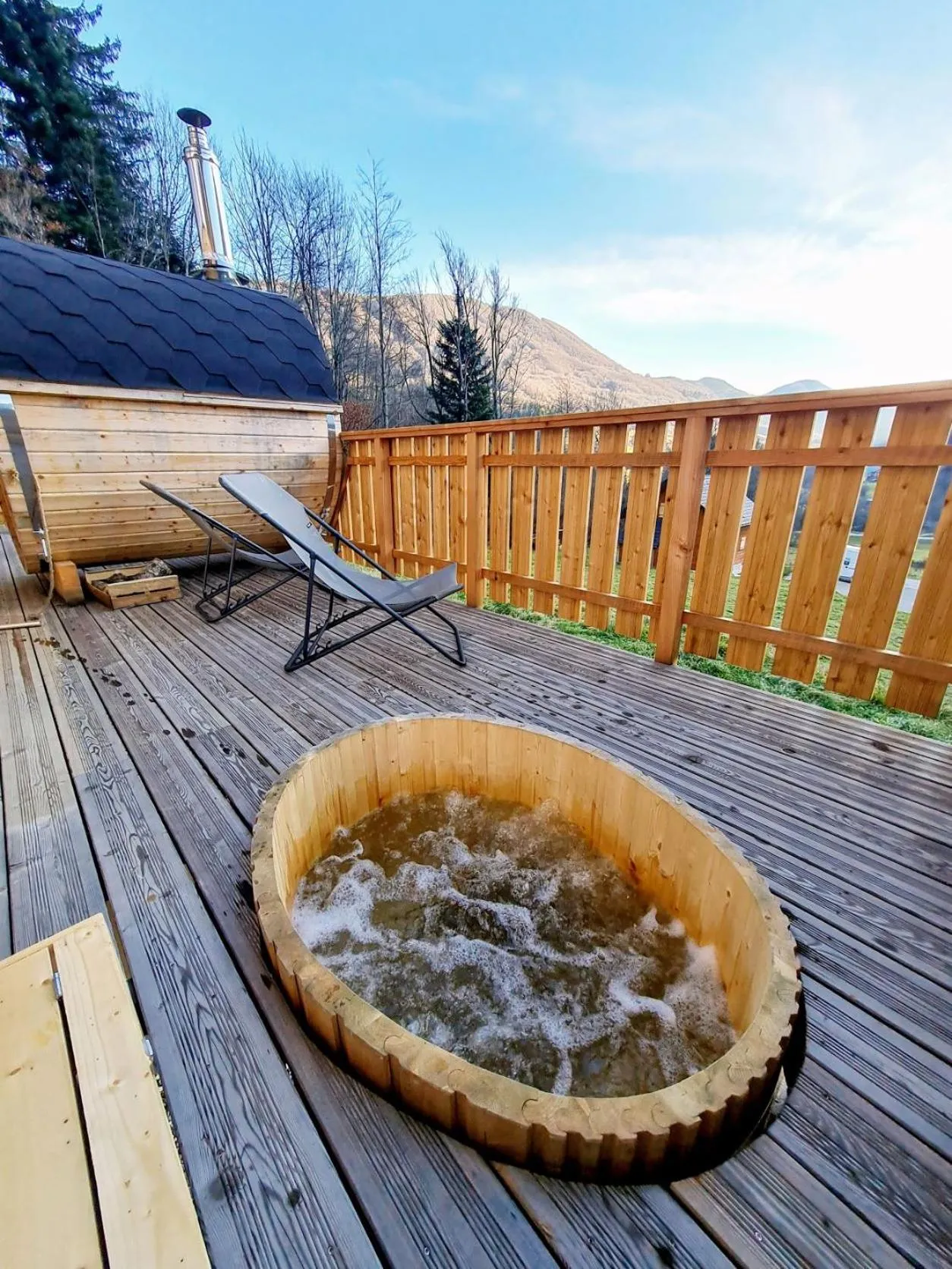 Hot Tub in Le Chalet Du Blanc Spa yoga