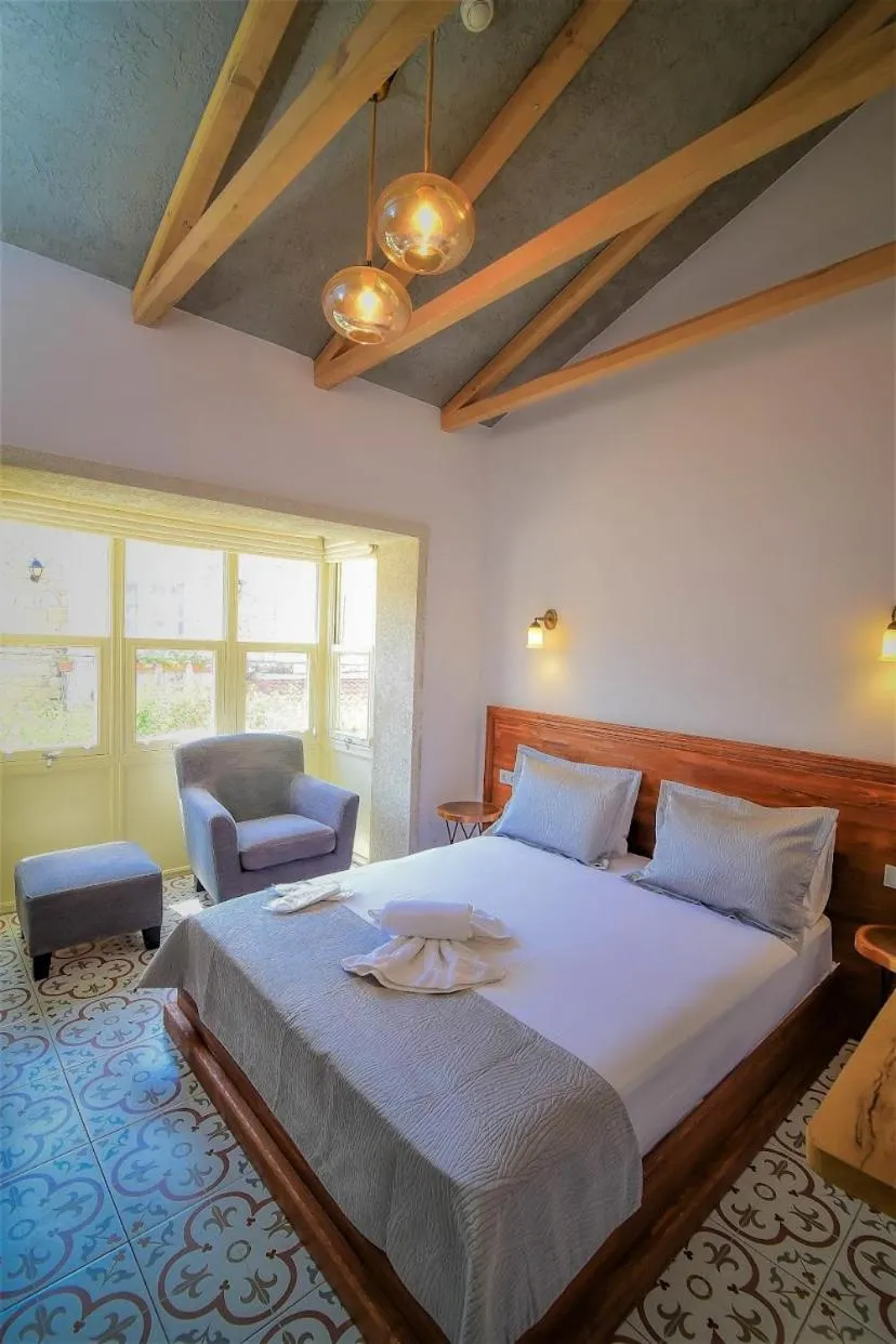 Photo of the whole room, Bed in Micel Otel Alacati