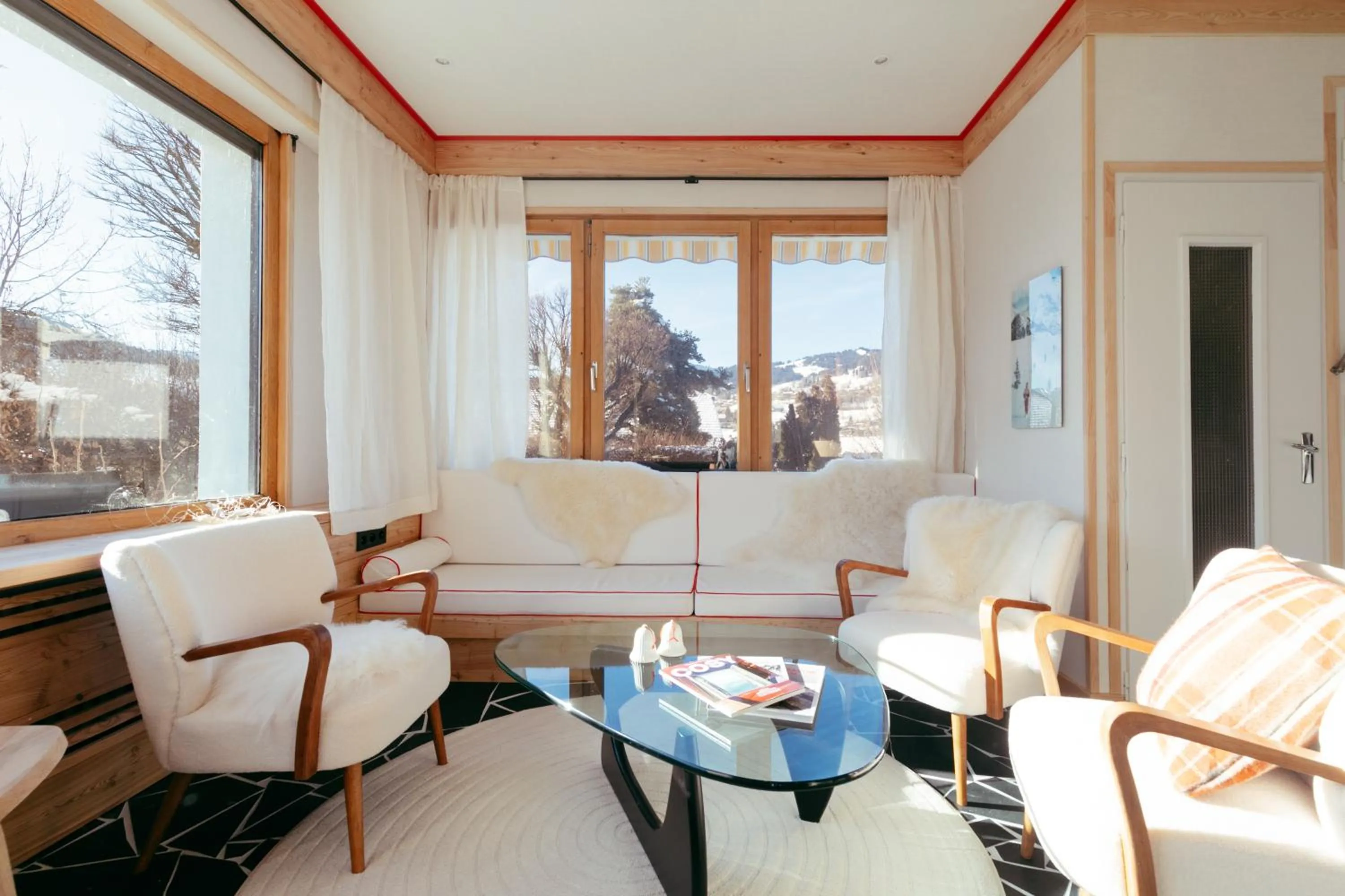 Seating area in Hôtel Le Caprice Des Neiges Combloux