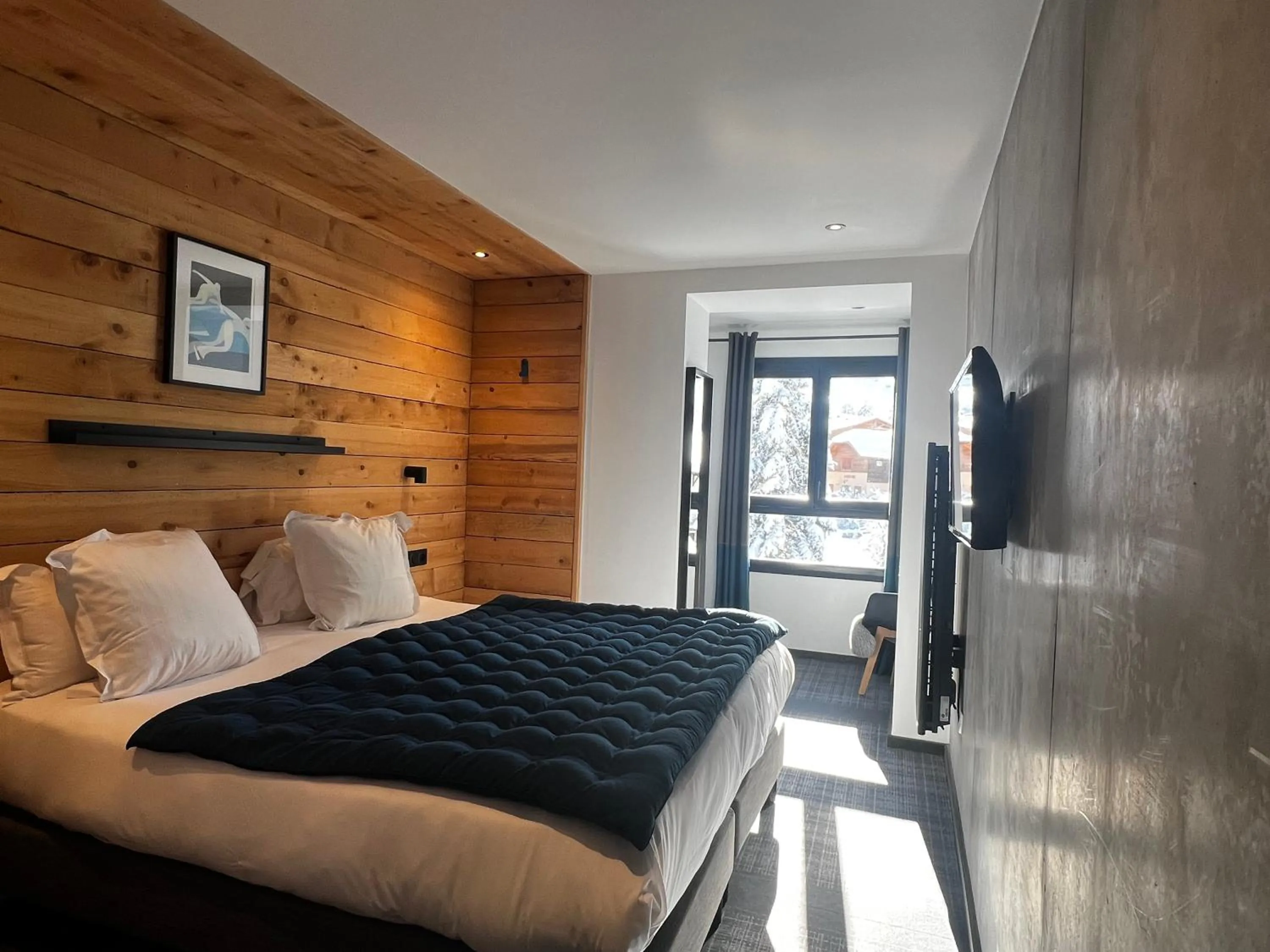 Bed in Hôtel 16 | 150 Montagne & Spa Nuxe