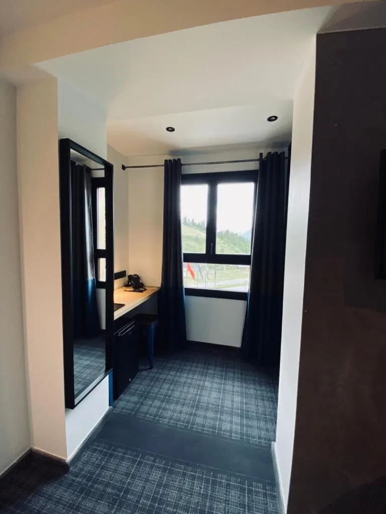 Bedroom in Hôtel 16 | 150 Montagne & Spa Nuxe