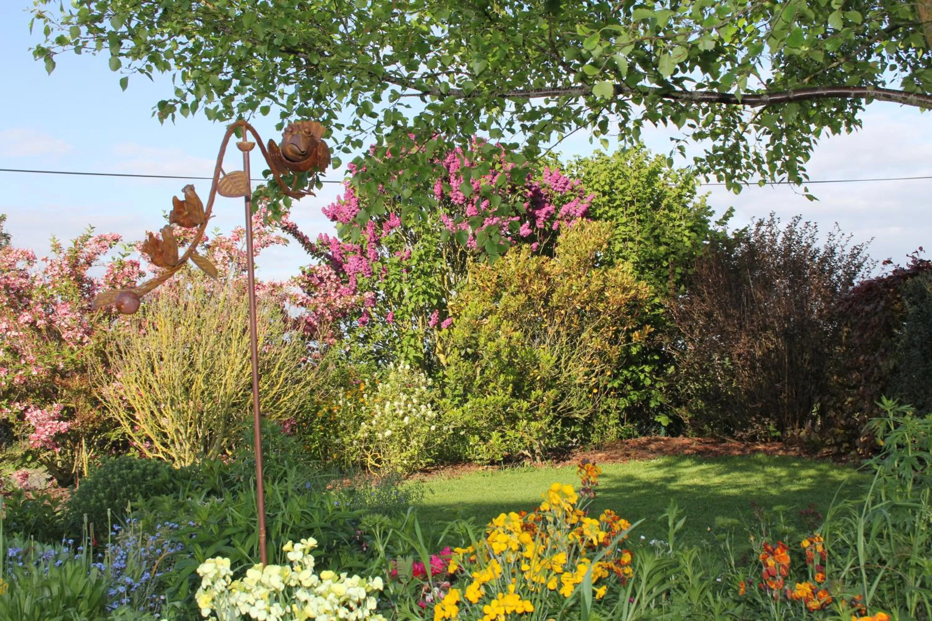 Garden in Chambre D'hotes Le Clos Fleuri