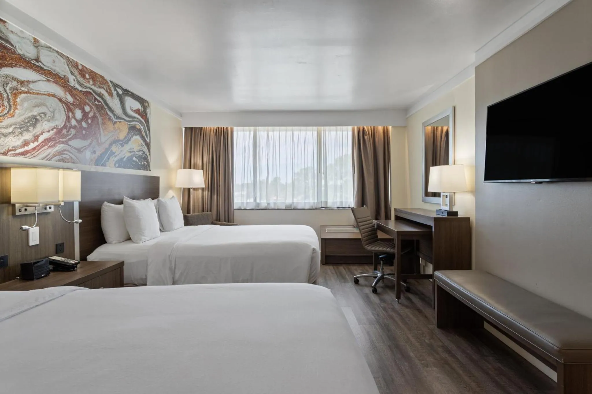 Photo of the whole room, Bed in Crowne Plaza Executive Center Baton Rouge by IHG