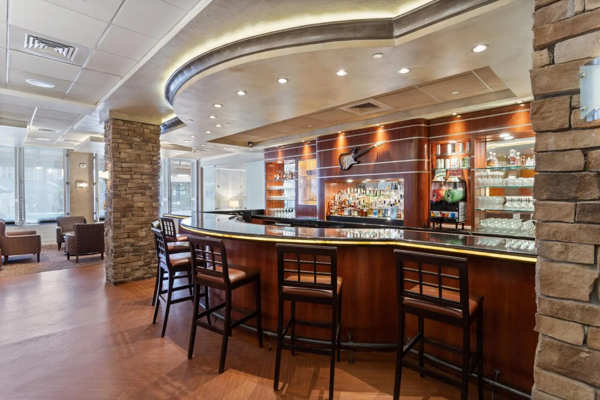 Lounge or bar in Crowne Plaza Executive Center Baton Rouge by IHG