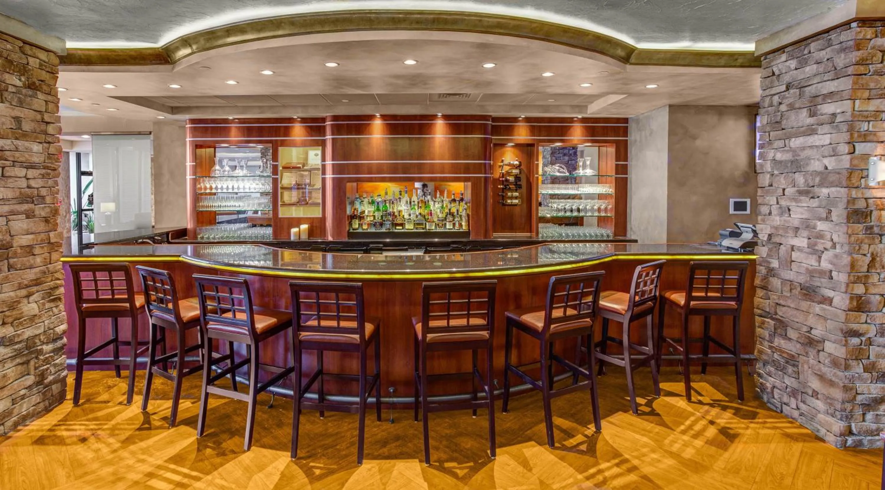 Lounge or bar in Crowne Plaza Executive Center Baton Rouge by IHG