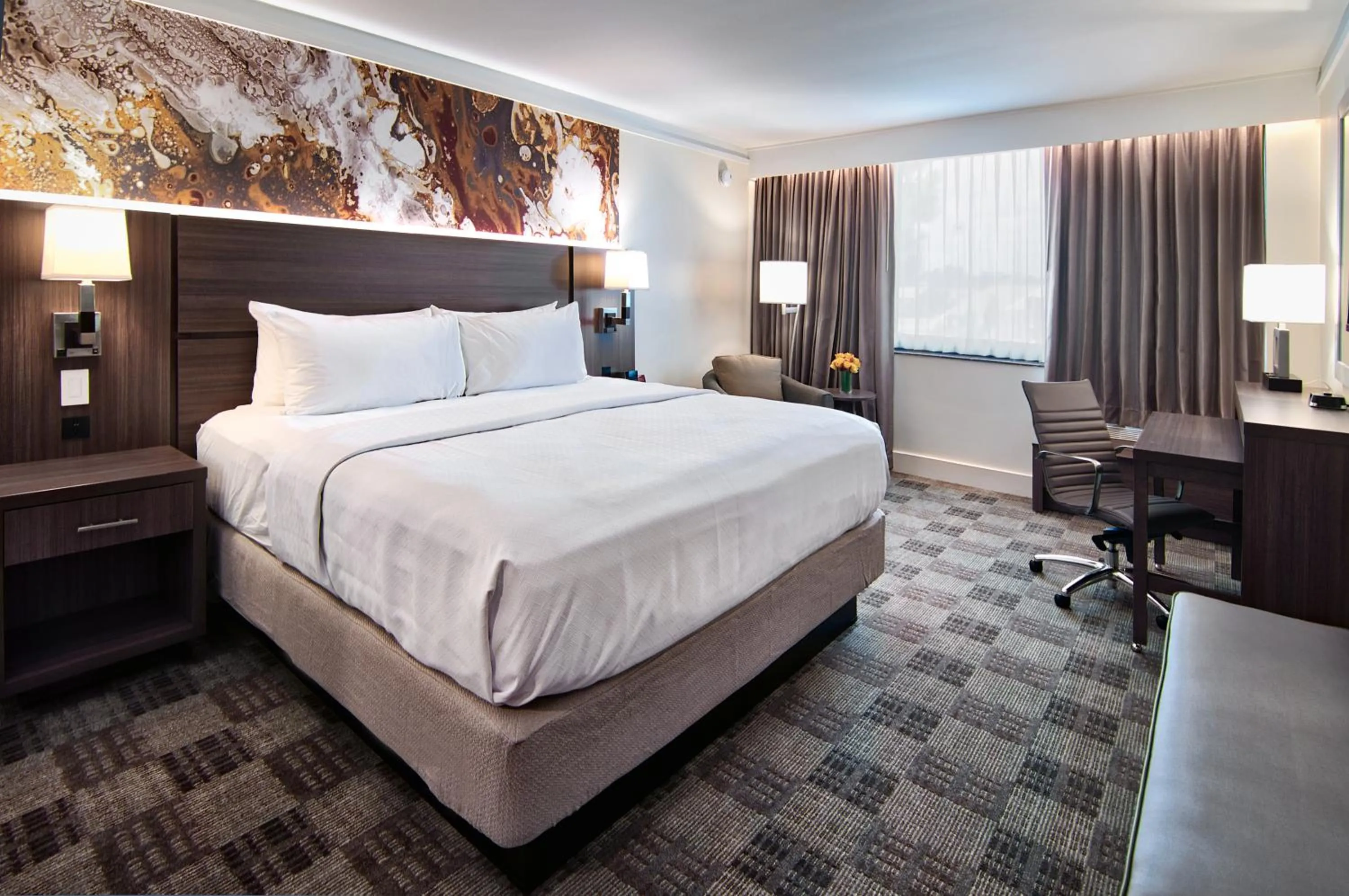 Photo of the whole room, Bed in Crowne Plaza Executive Center Baton Rouge by IHG
