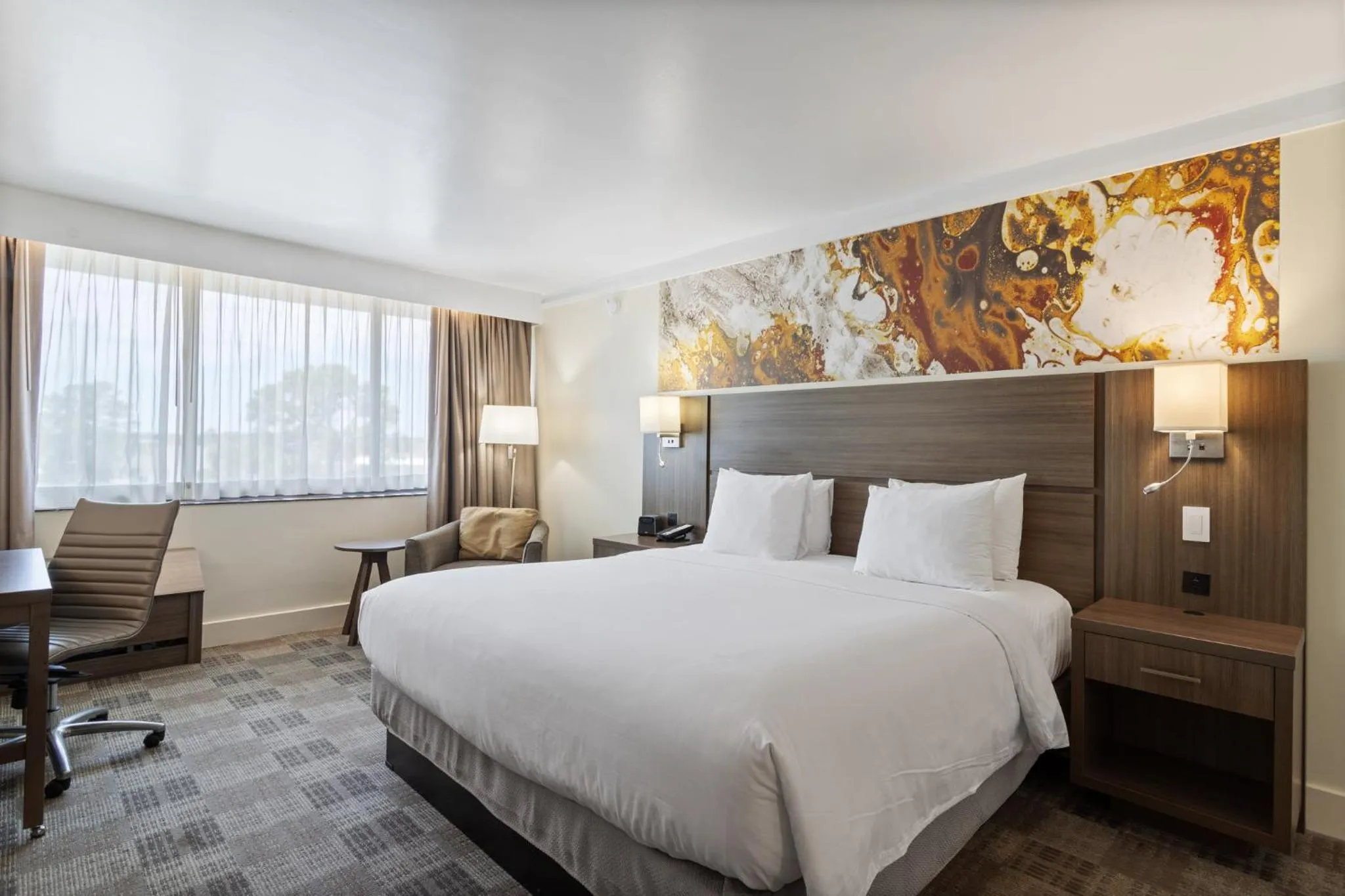 Photo of the whole room, Bed in Crowne Plaza Executive Center Baton Rouge by IHG