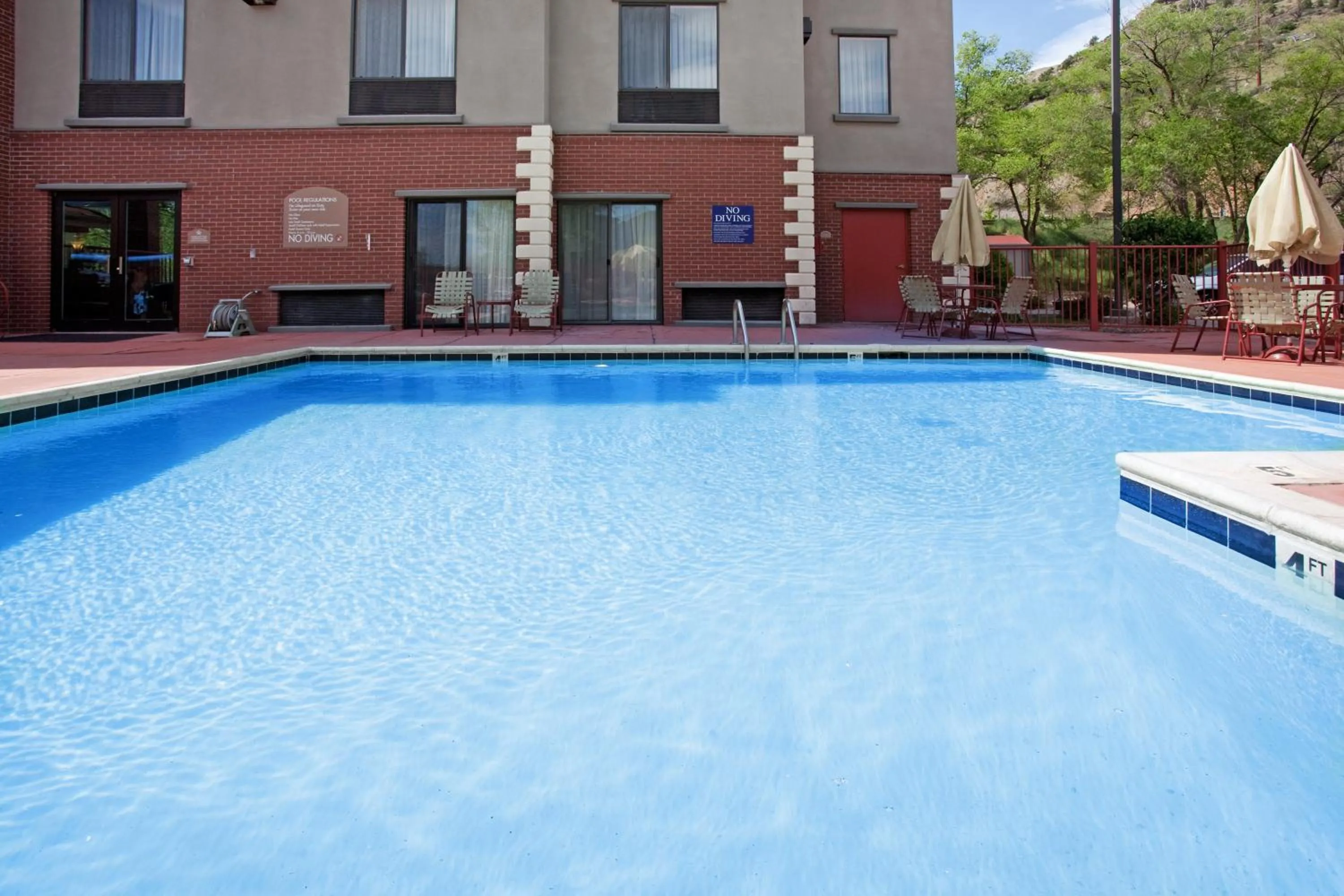 Swimming pool in Holiday Inn Express Glenwood Springs Aspen Area by IHG