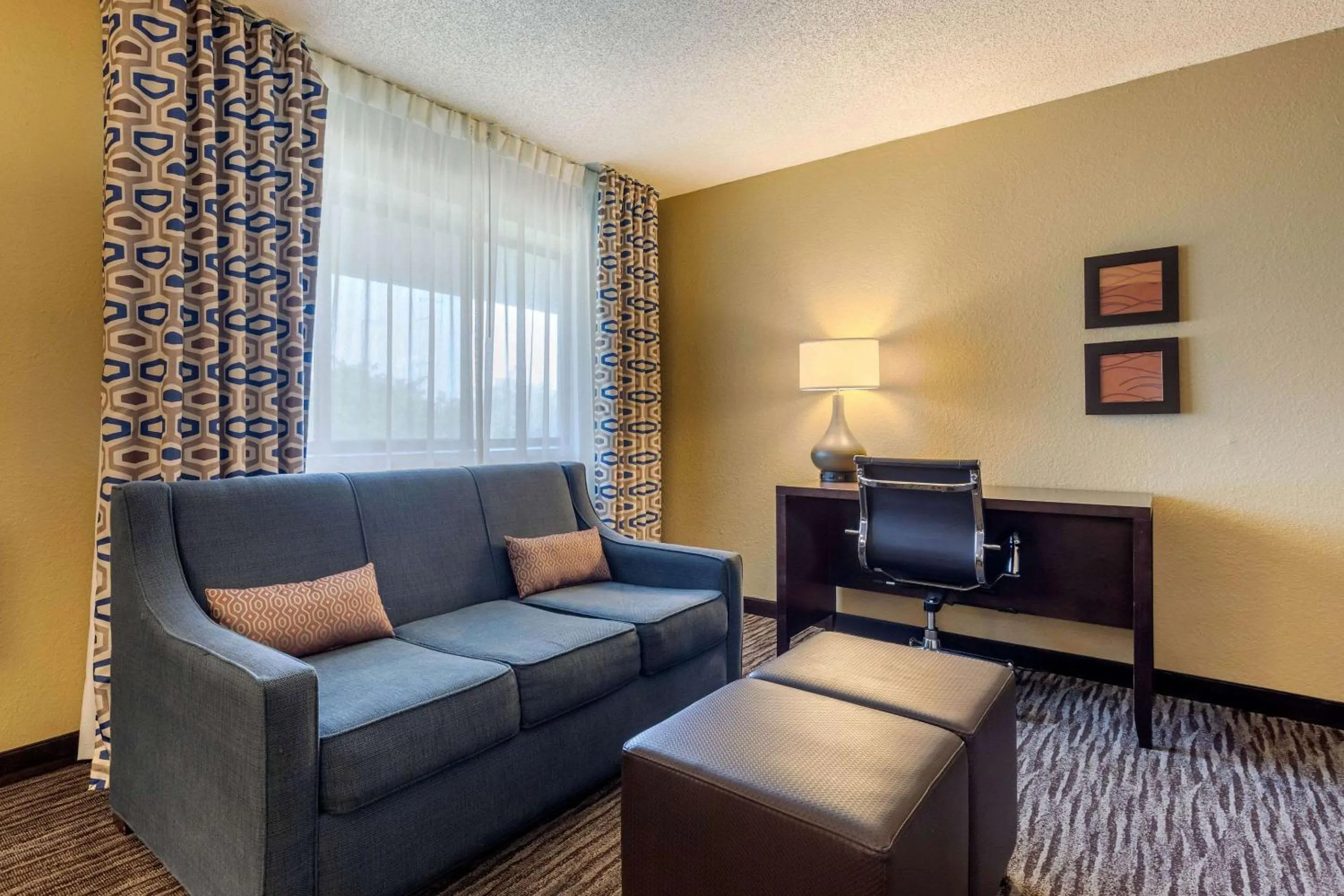 Bedroom in Suburban Studios Arlington Heights Elk Grove