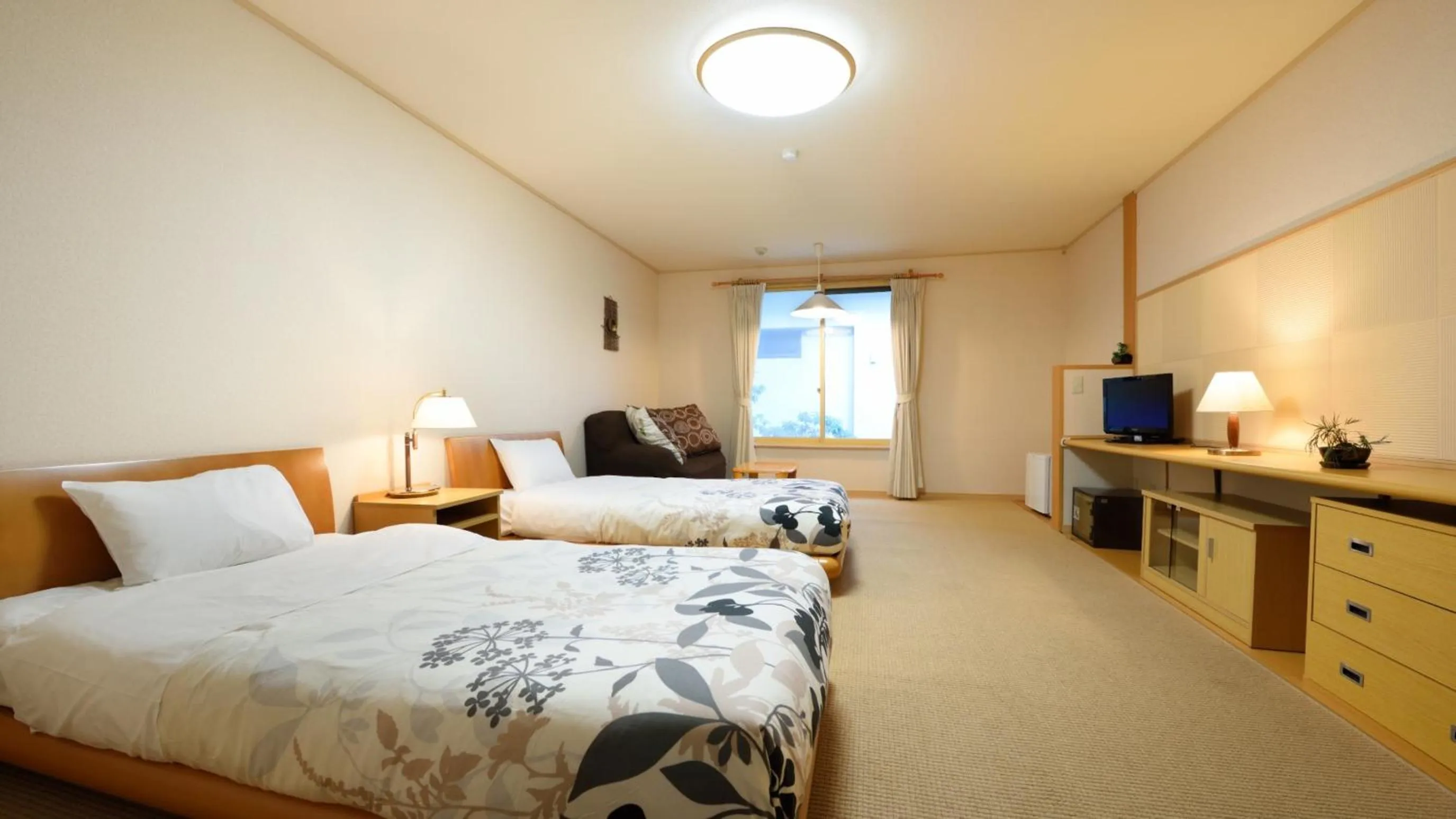 Living room, Bed in Sannouzan Onsen Zuisenkyo
