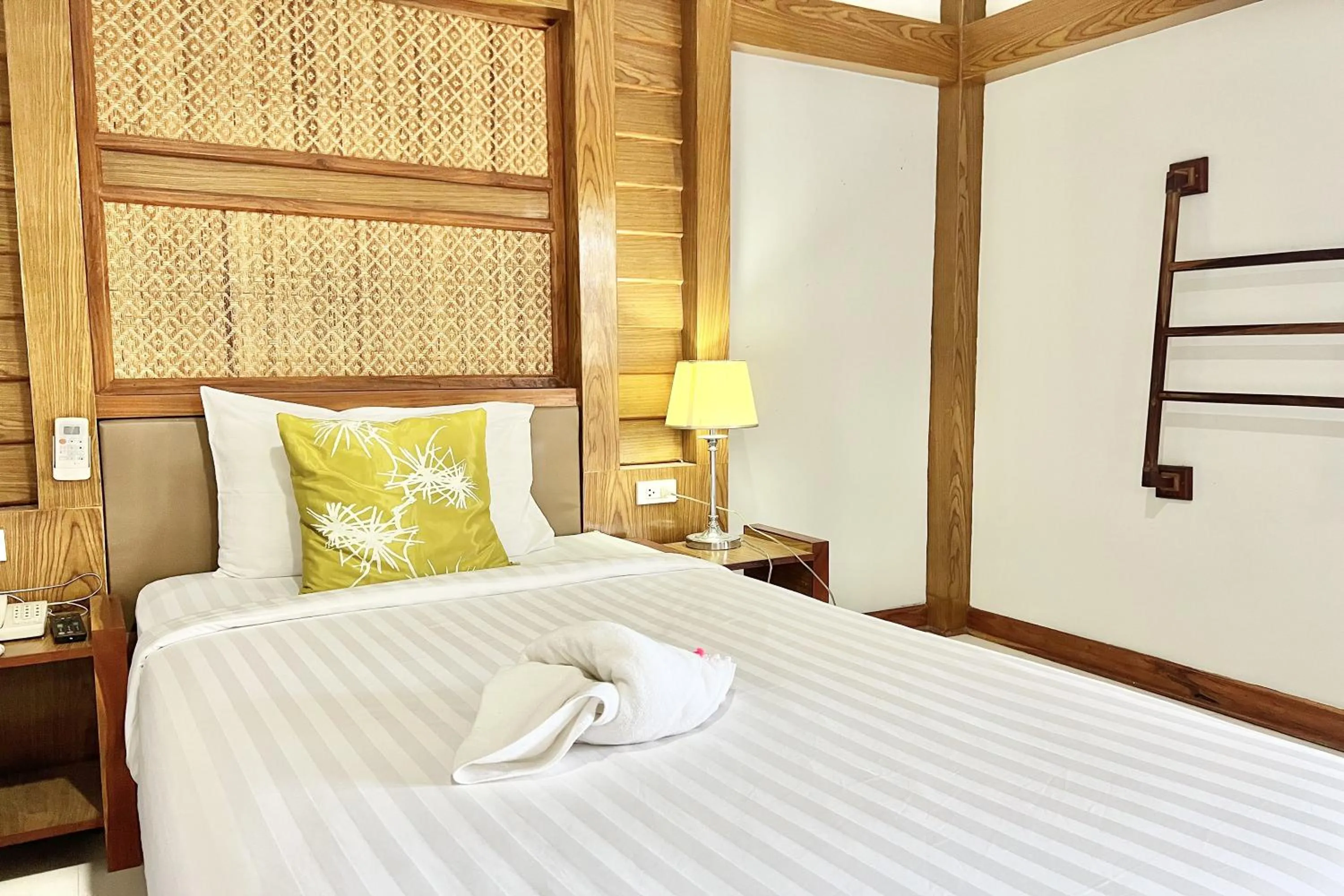 Bed in Ruentara Resort & Villa
