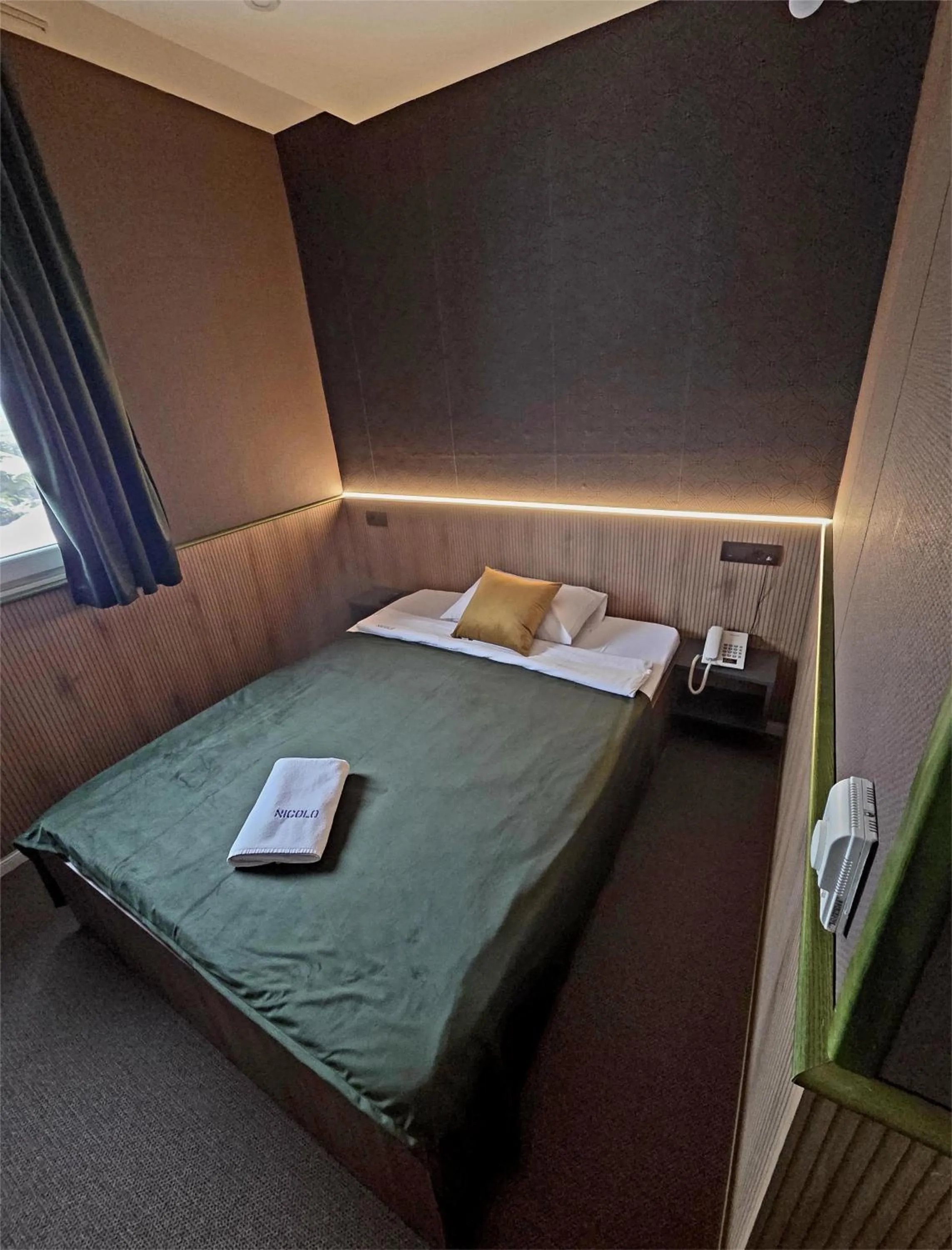 Bed in Garni Hotel & Spa Nicolo