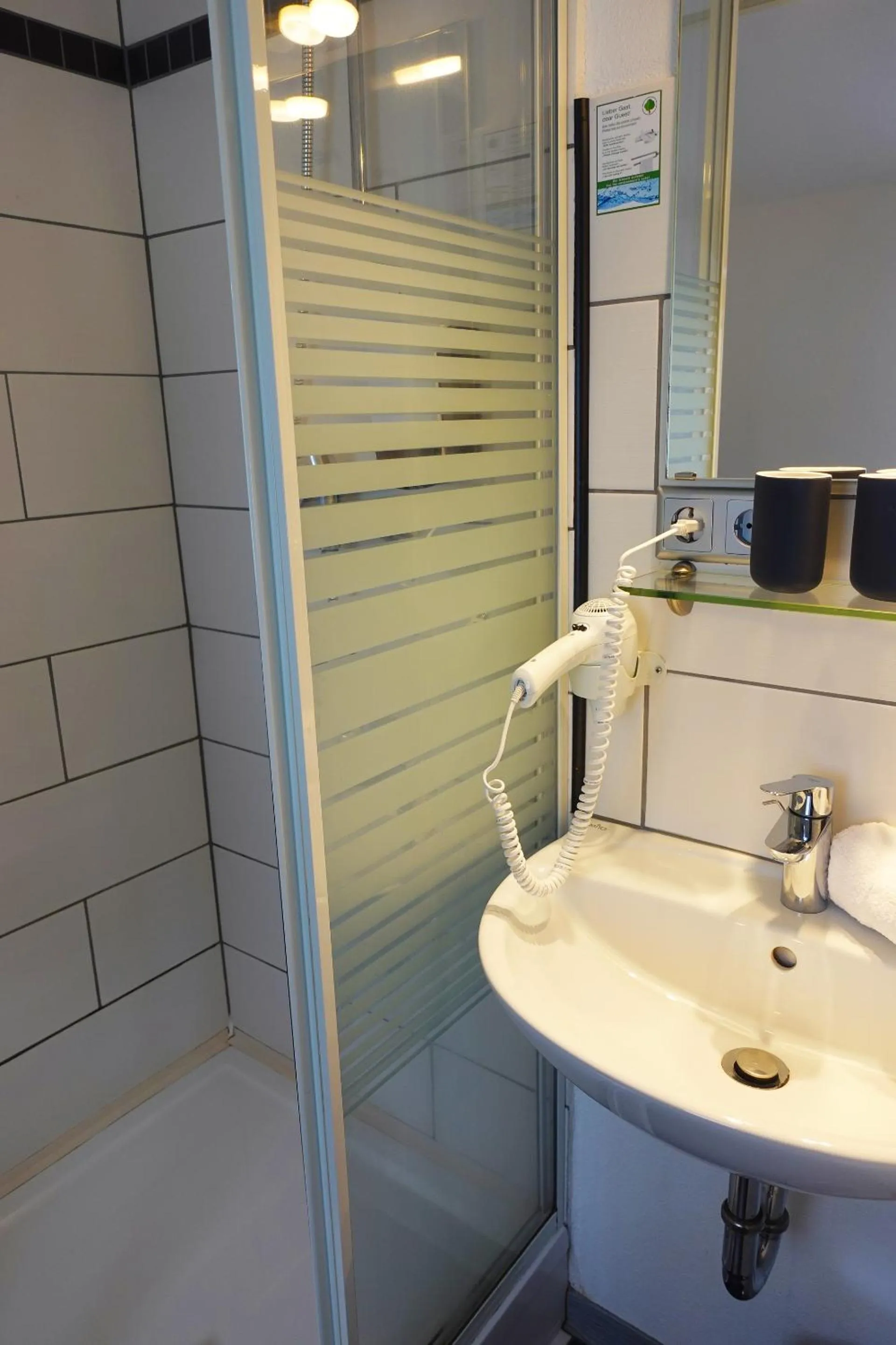 Bathroom in Hotel Berghof Wasserkuppe & Gästehaus Fuldaquelle