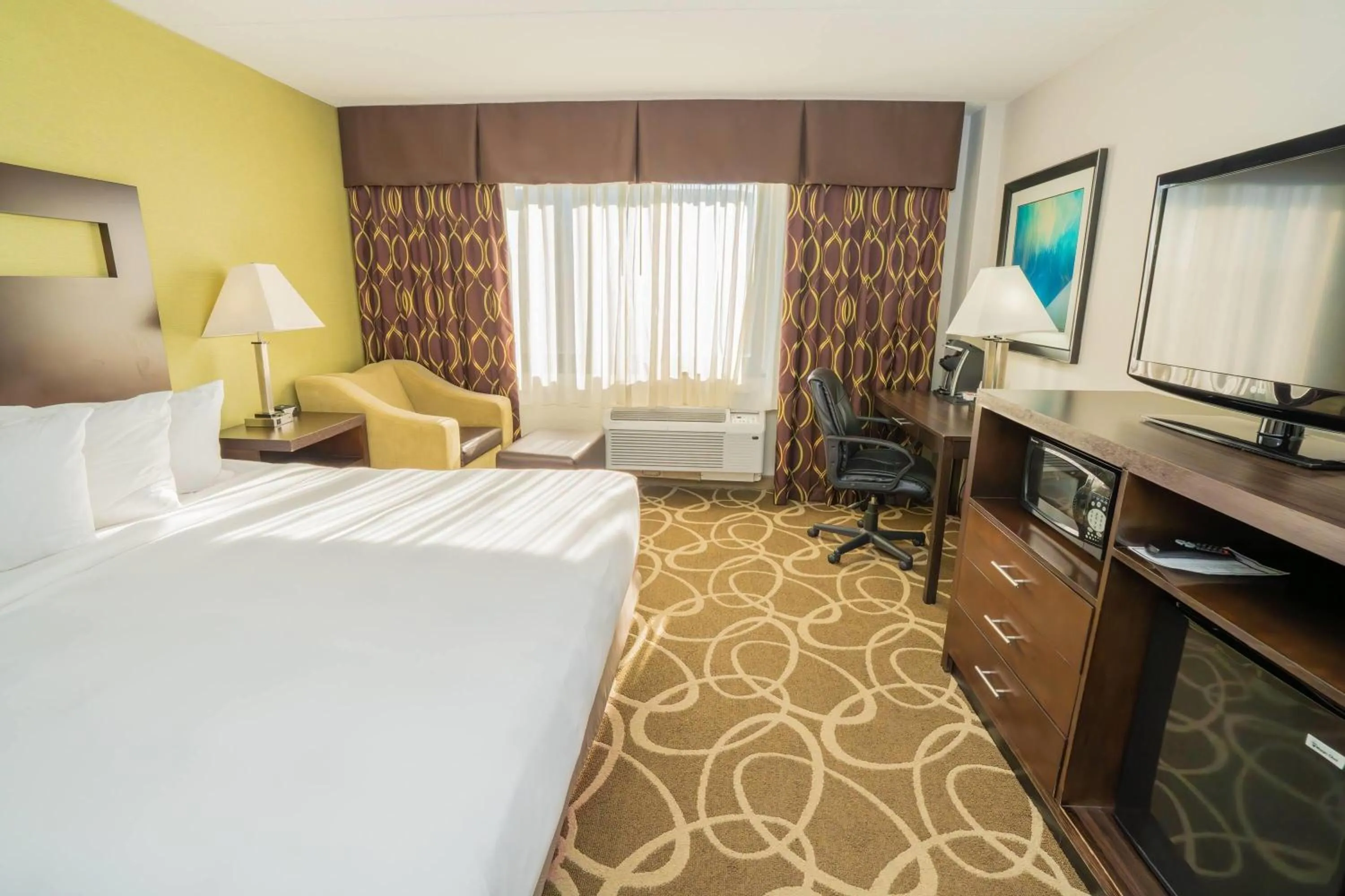 Photo of the whole room, Bed in Elimwood Hotel, a Ramada by Wyndham