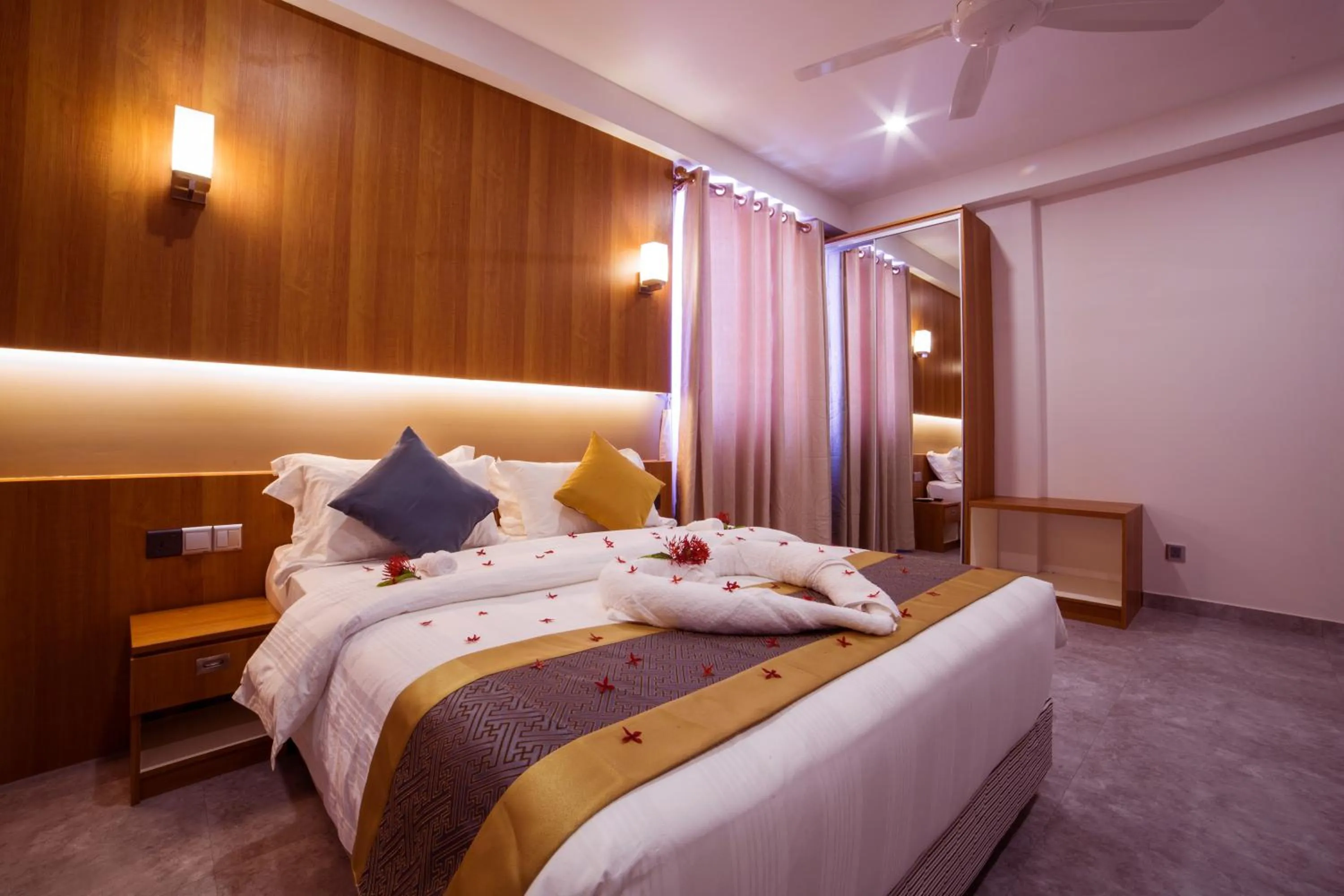 Bed in Kuredhi Beach Inn