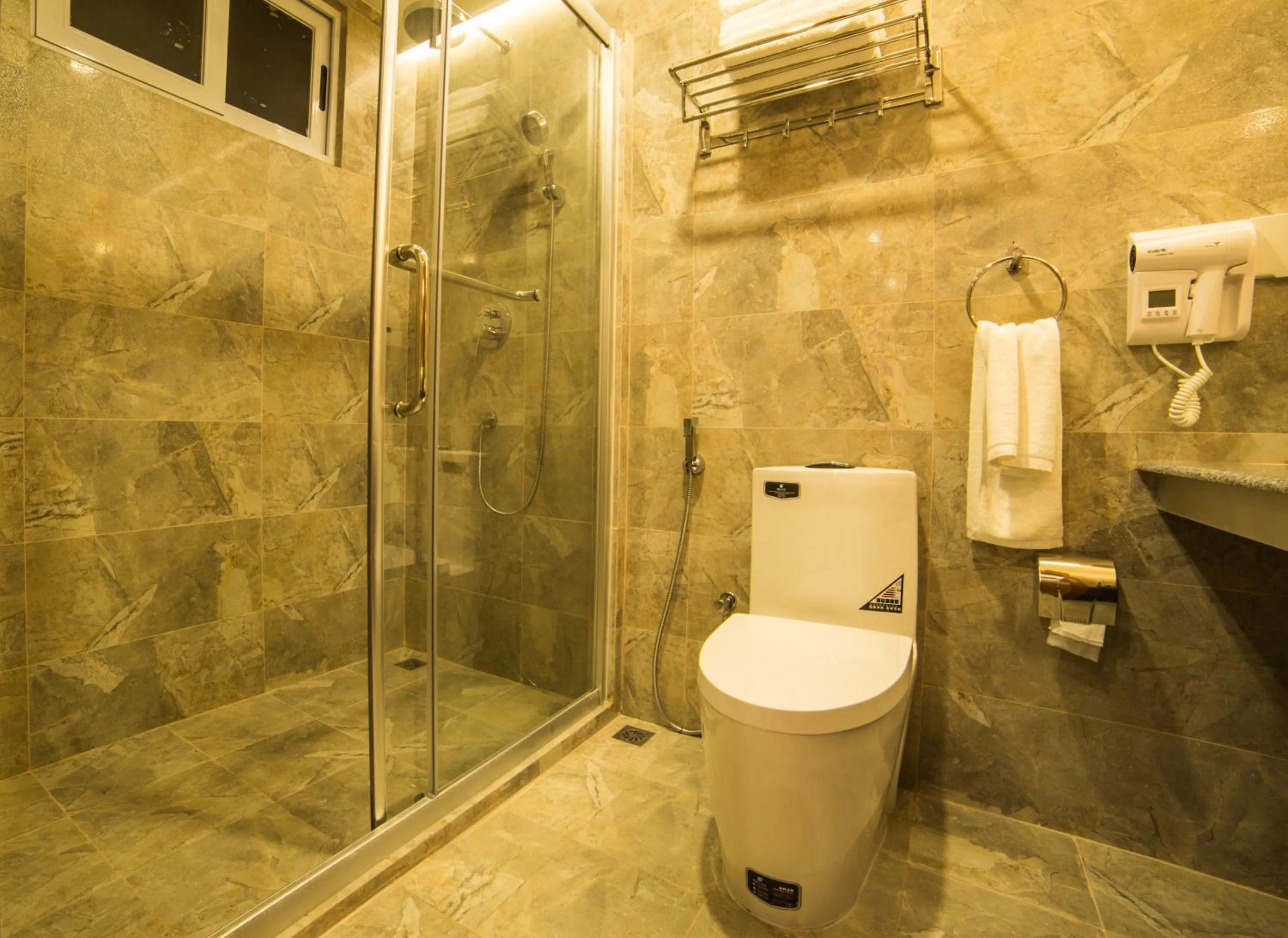 Shower in Kuredhi Beach Inn