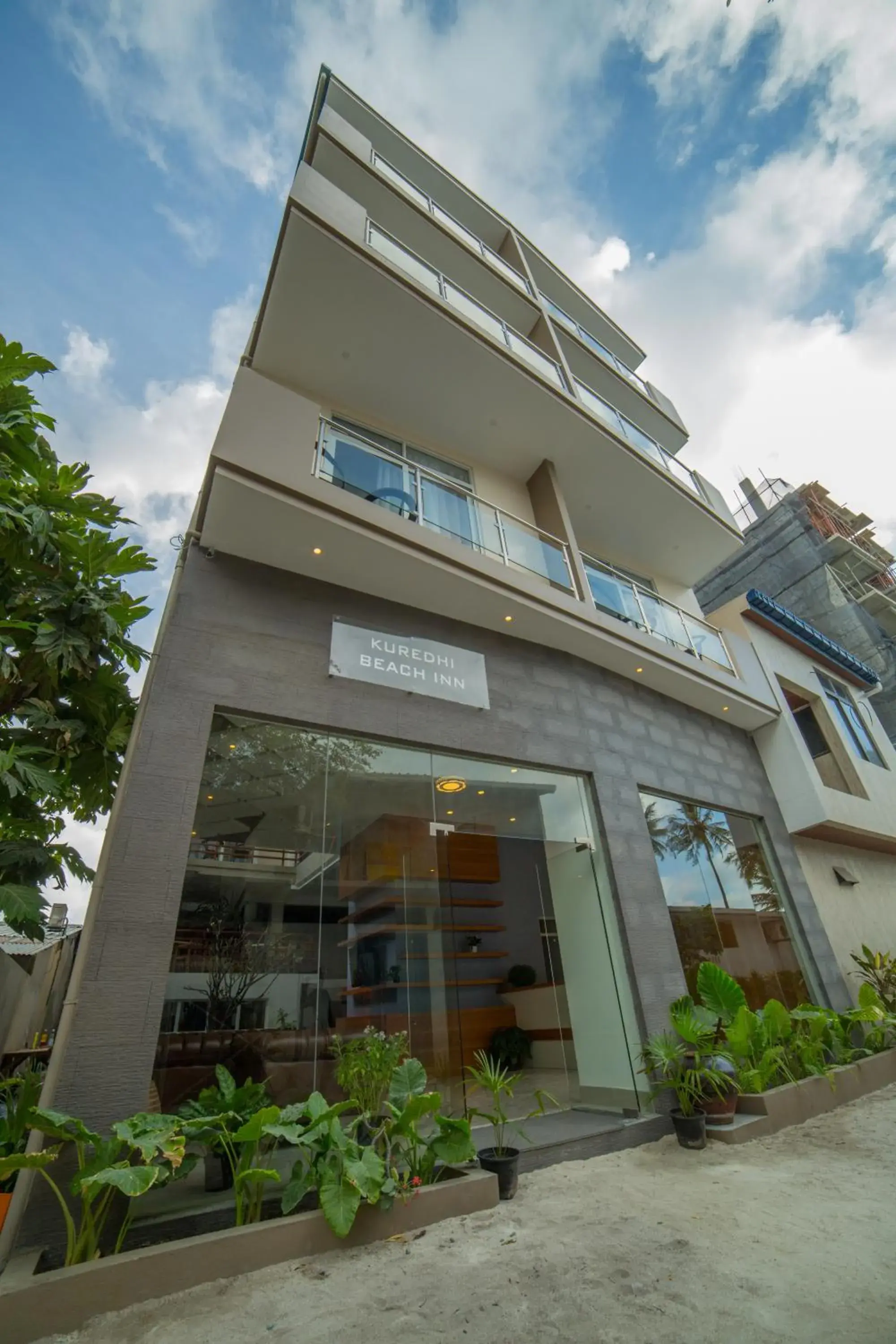 Property building in Kuredhi Beach Inn Property building in Kuredhi Beach Inn