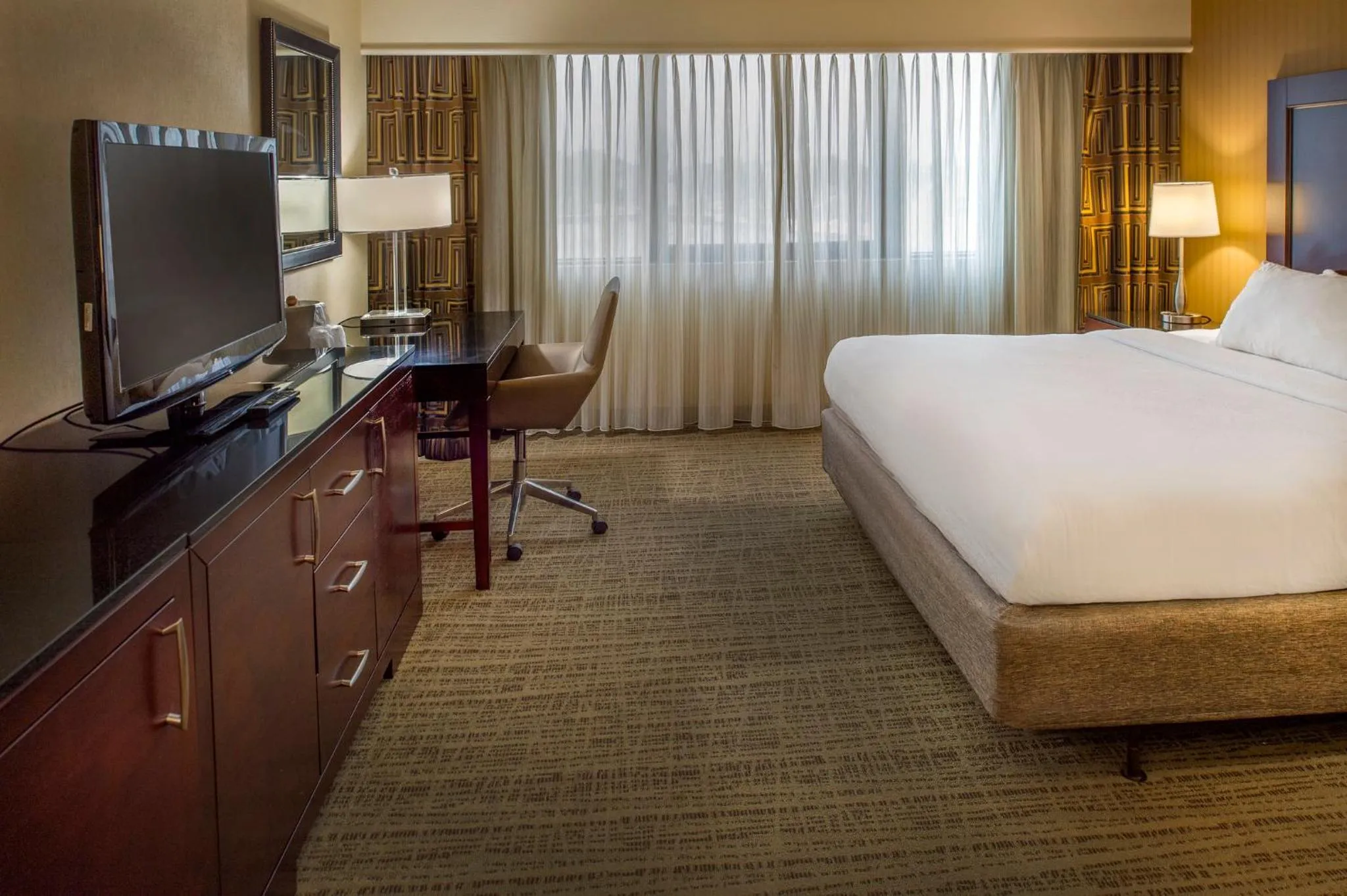 Photo of the whole room, Bed in Crowne Plaza Hotel St. Louis Airport by IHG