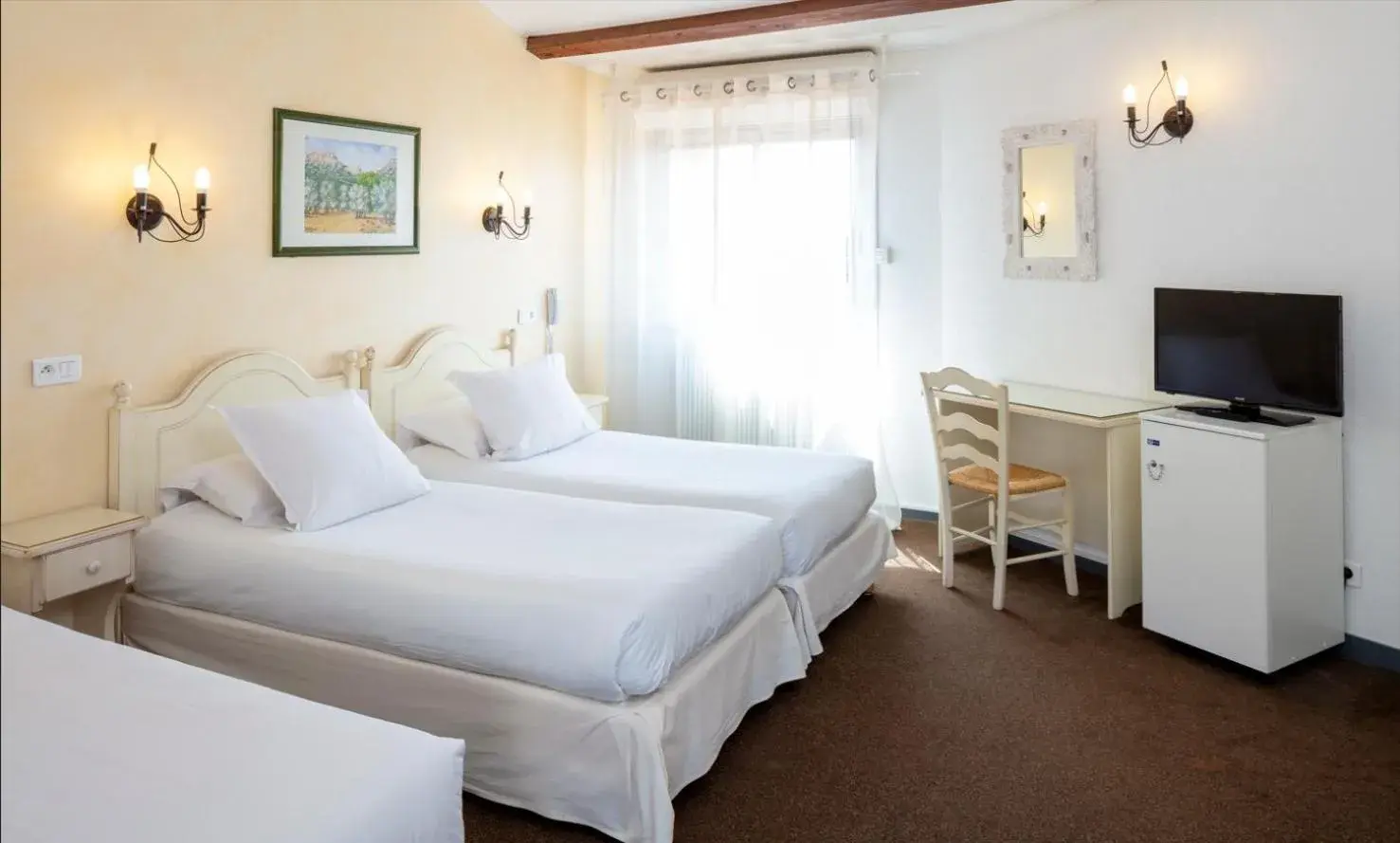 Triple Room in Hôtel Le Mozart Triple Room in Hôtel Le Mozart