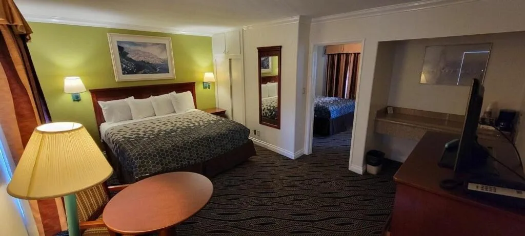 Bed in Redondo Inn and Suites