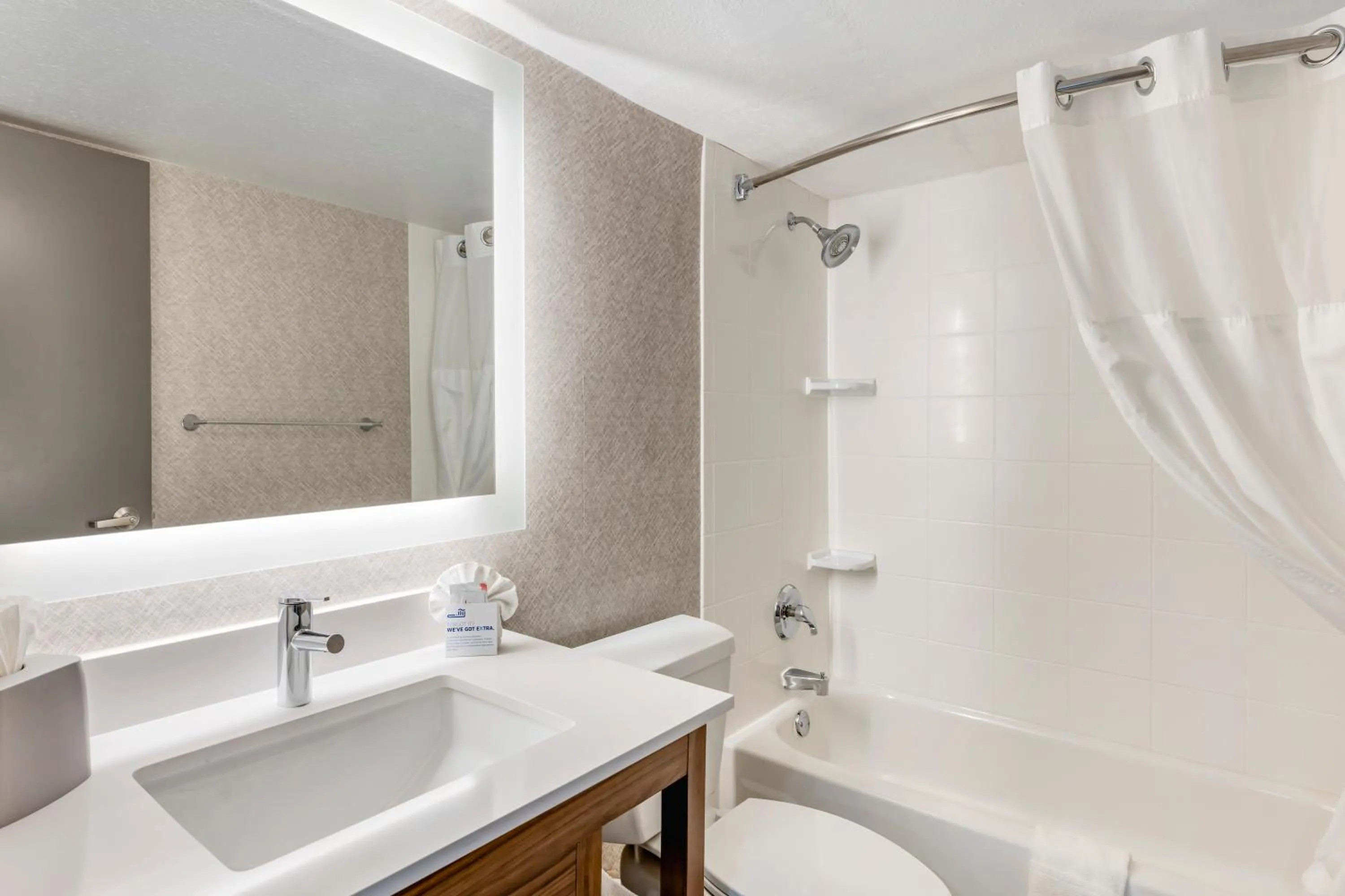 Bathroom in Holiday Inn Express Chicago-Downers Grove by IHG