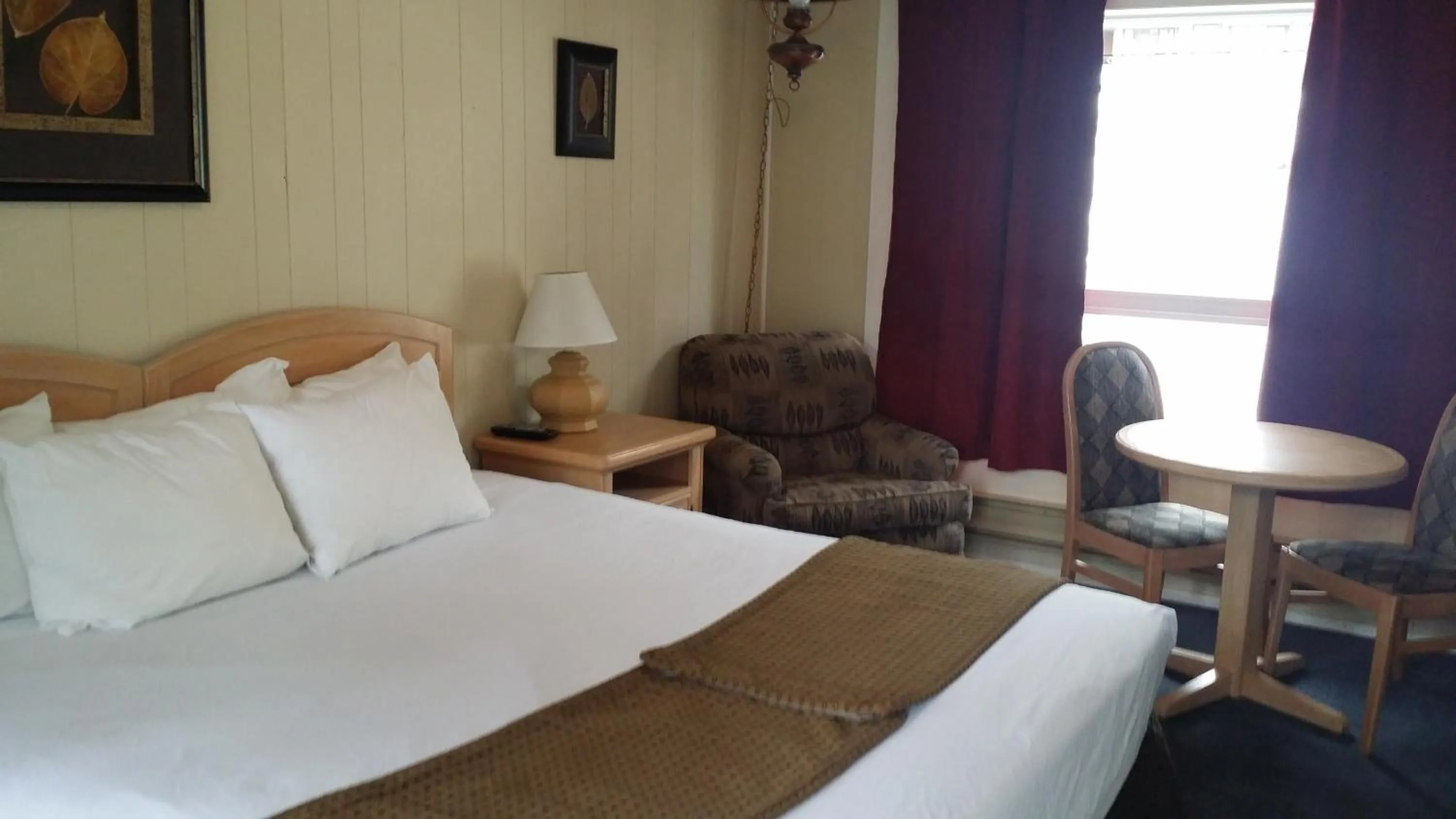 Bed in AppleTree Inn