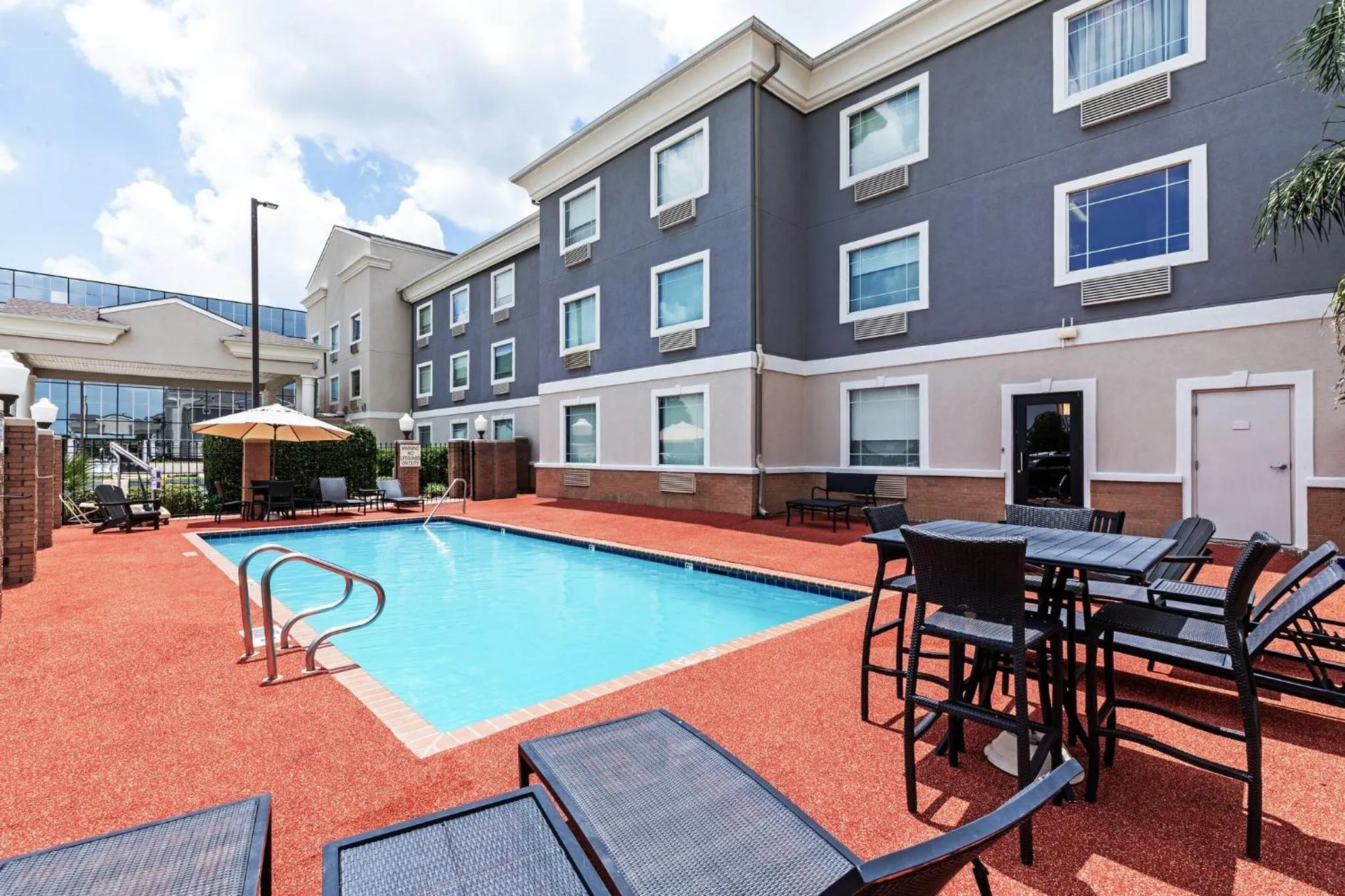 Swimming pool in Holiday Inn Express Harvey-Marrero by IHG